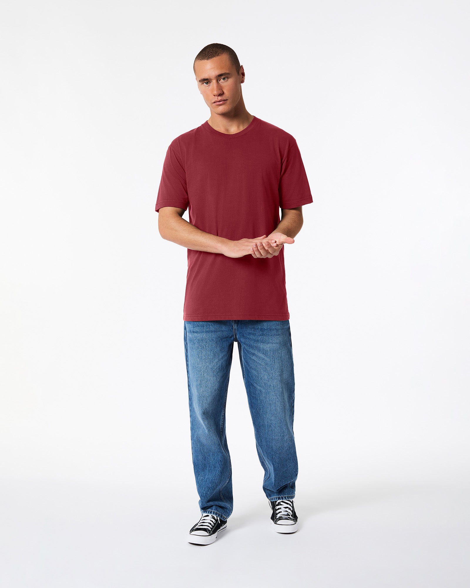 Male mode wearing cranberry colour American Apparel Fine jersey Unisex Short Sleeve Crew Neck Tee (Front pose) -cranberry