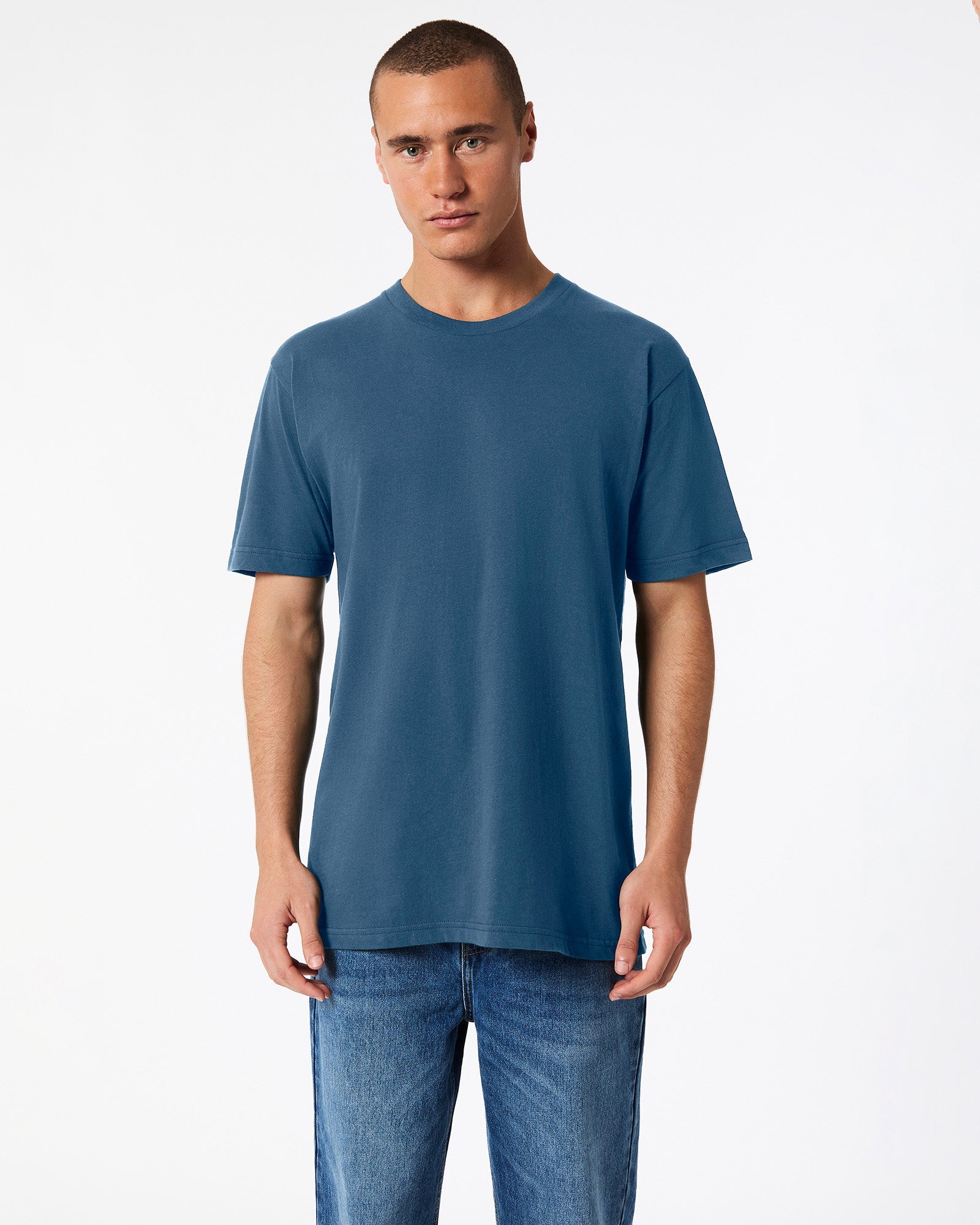 Male model wearing American Apparel Powder Sea Blue Colour Fine Jersey Unisex Short Sleeve Crew Neck Tee (front pose) -sea blue