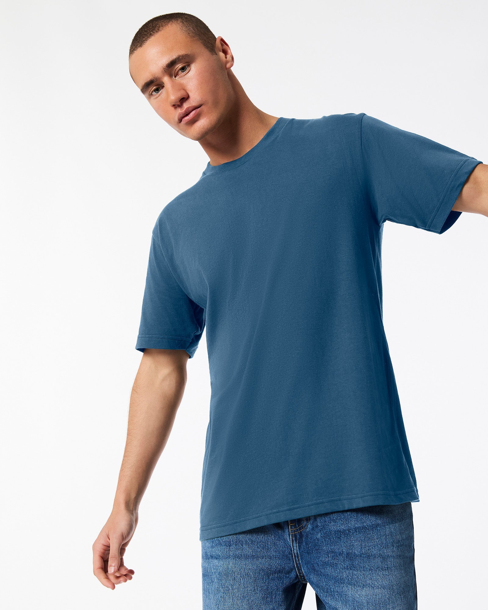 Male model wearing American Apparel Powder sea Blue Colour Fine Jersey Unisex Short Sleeve Crew Neck Tee (front pose) -sea blue
