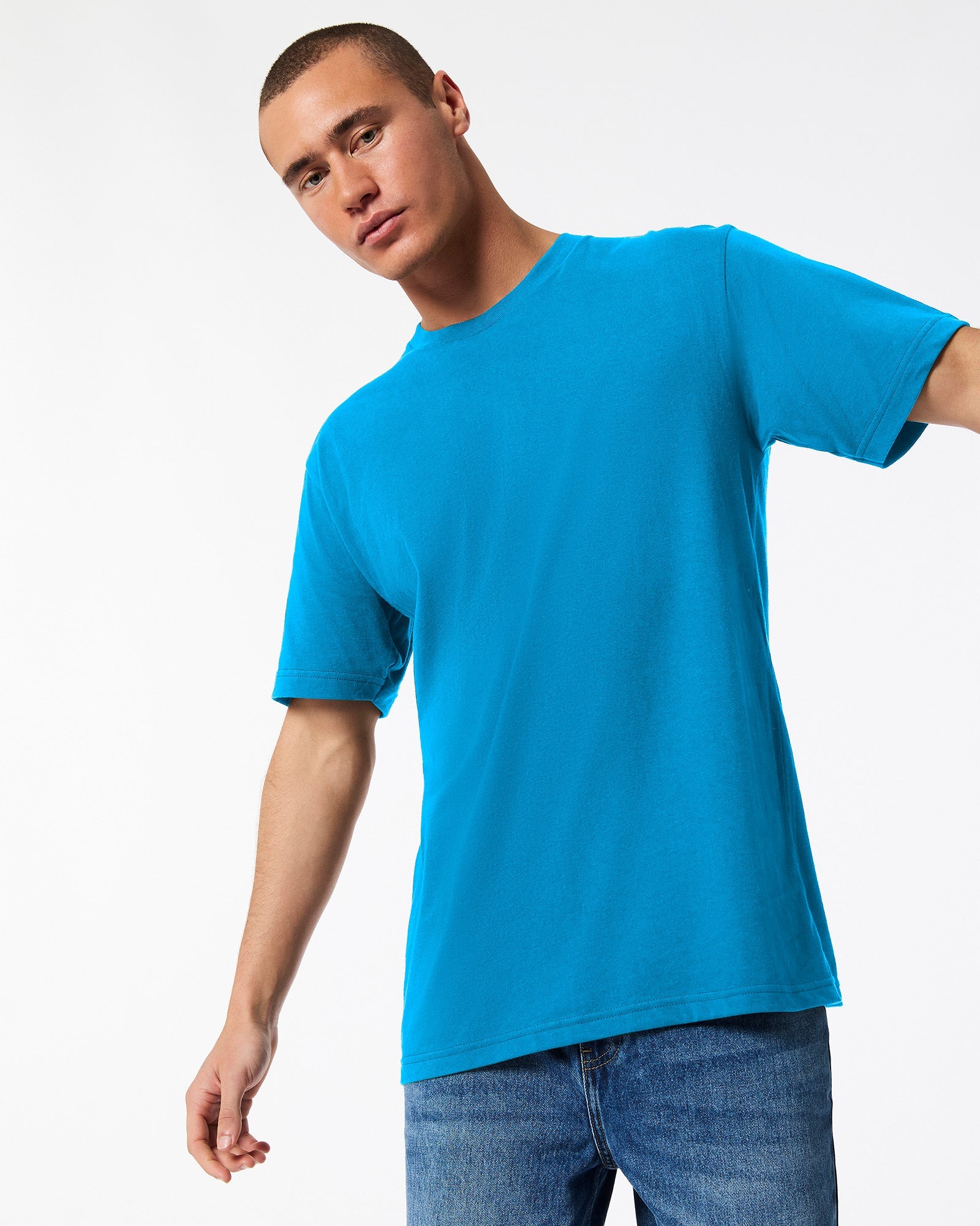 Male model wearing American Apparel Powder teal Colour Fine Jersey Unisex Short Sleeve Crew Neck Tee (front pose) -teal