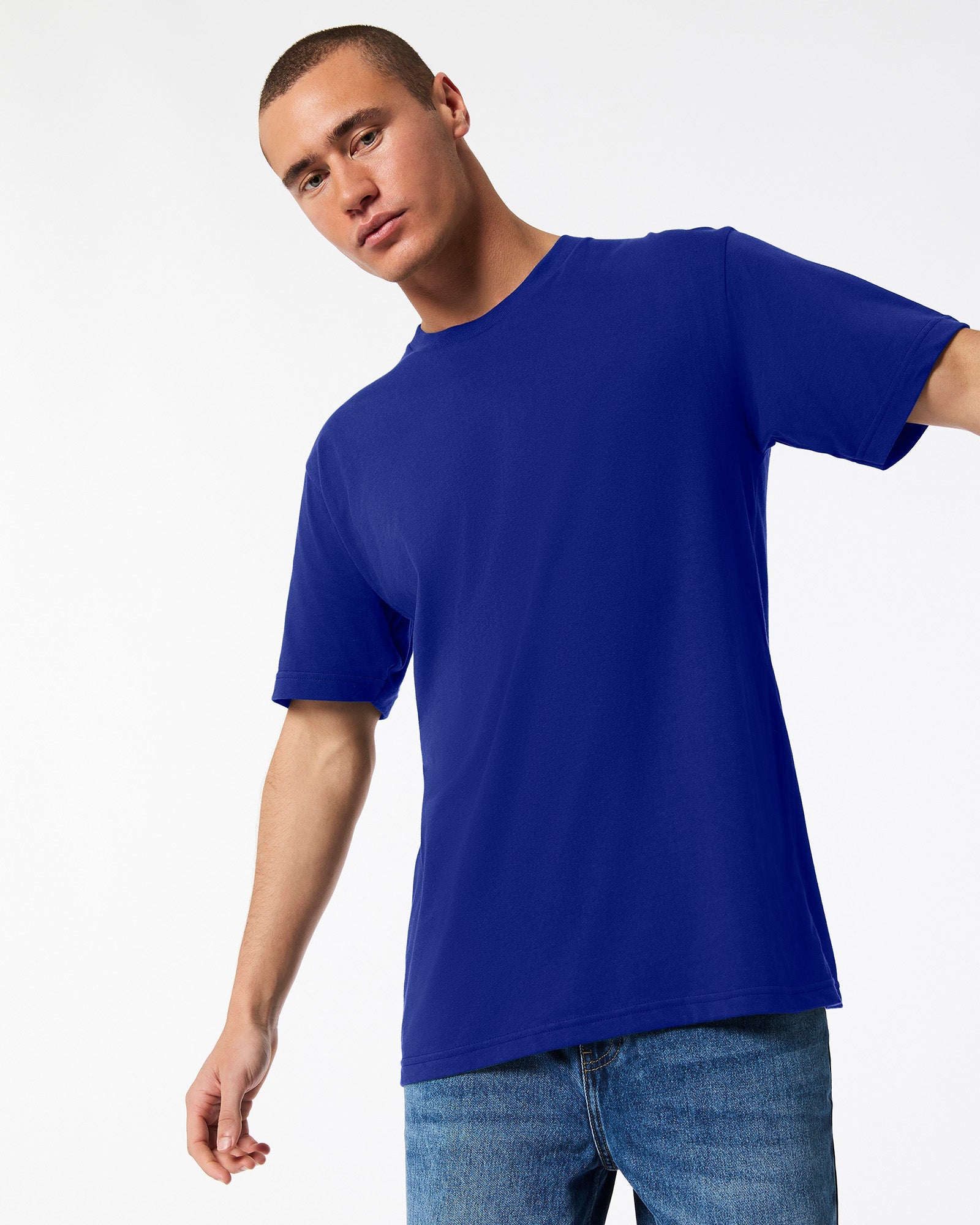 male model wearing Lapis colour Fine Jersey Unisex Crew Neck Tee (front pose) -lapis