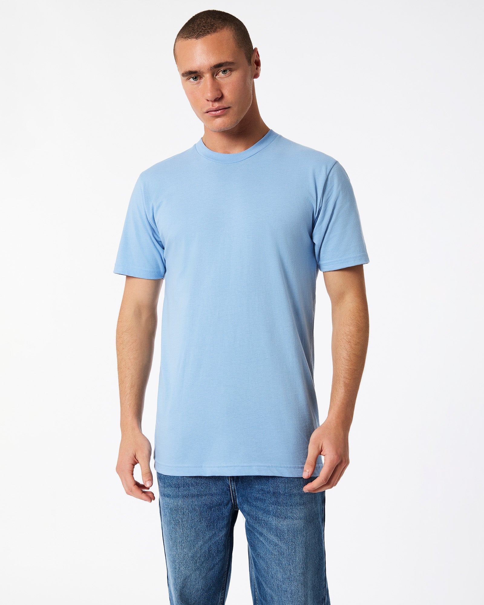 Male model wearing American Apparel Powder Blue Colour Fine Jersey Unisex Short Sleeve Crew Neck Tee (front pose) -powder blue