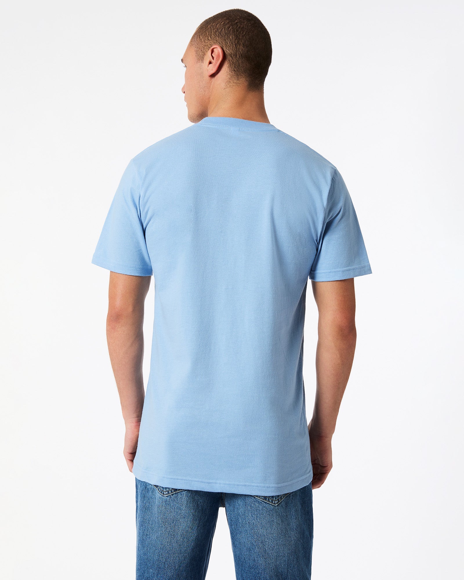 Male model wearing American Apparel Powder Blue Colour Fine Jersey Unisex Short Sleeve Crew Neck Tee (back pose) -powder blue