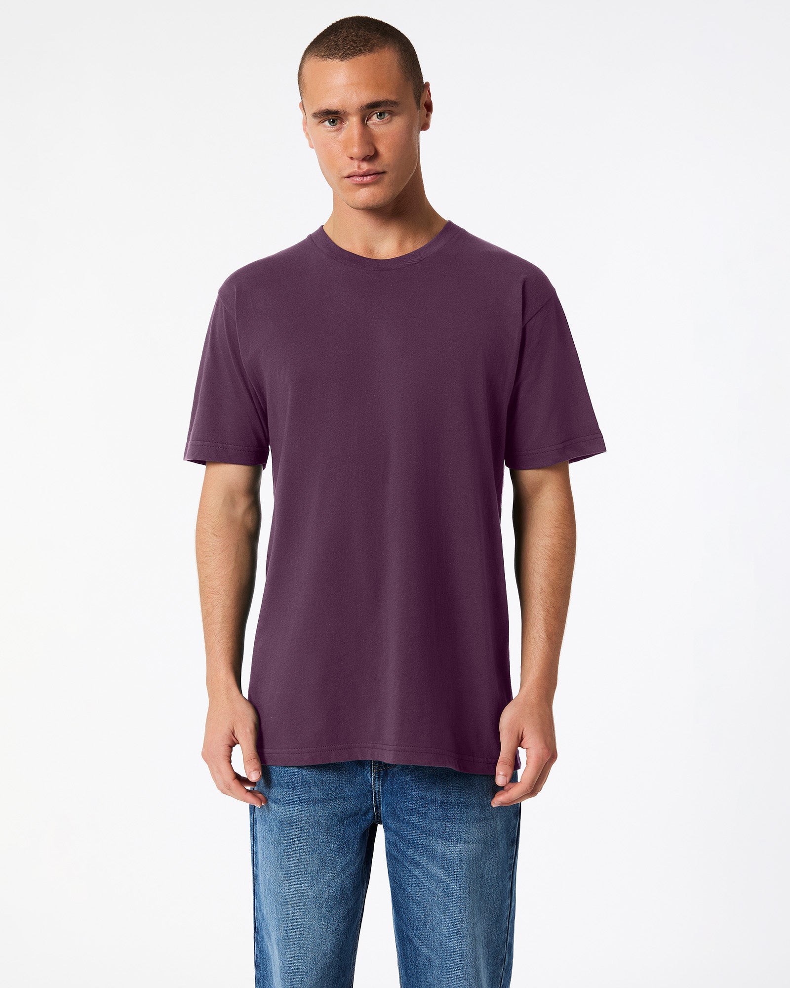 Male mode wearing eggplant colour American Apparel Fine jersey Unisex Short Sleeve Crew Neck Tee (Front pose) -eggplant