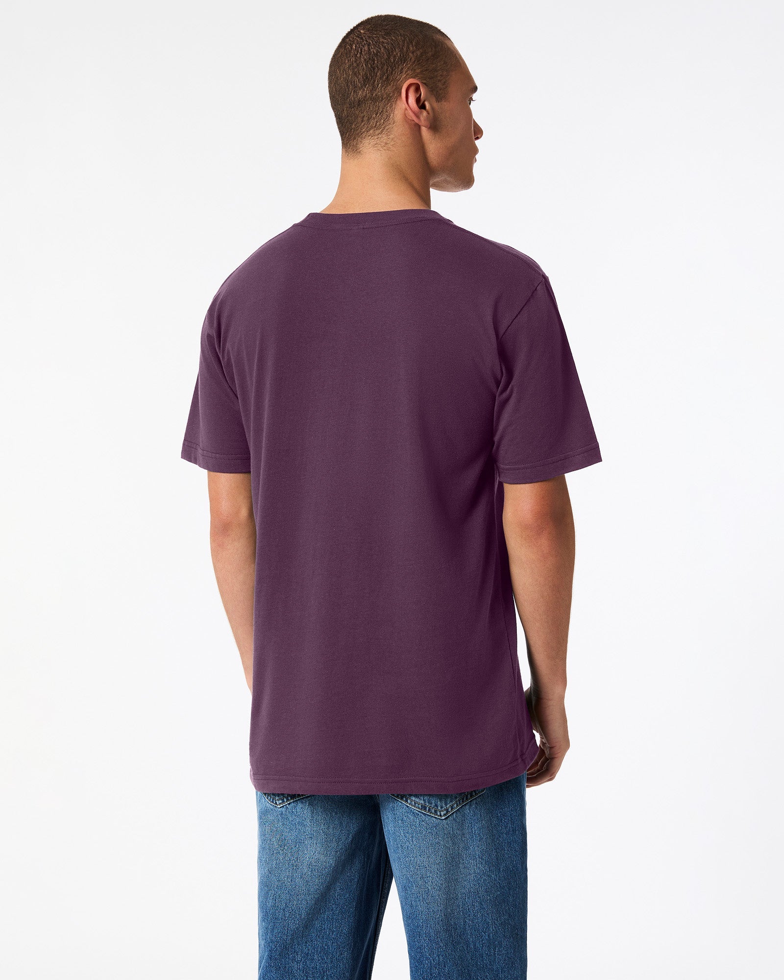 Male mode wearing eggplant colour American Apparel Fine jersey Unisex Short Sleeve Crew Neck Tee (back pose) -eggplant