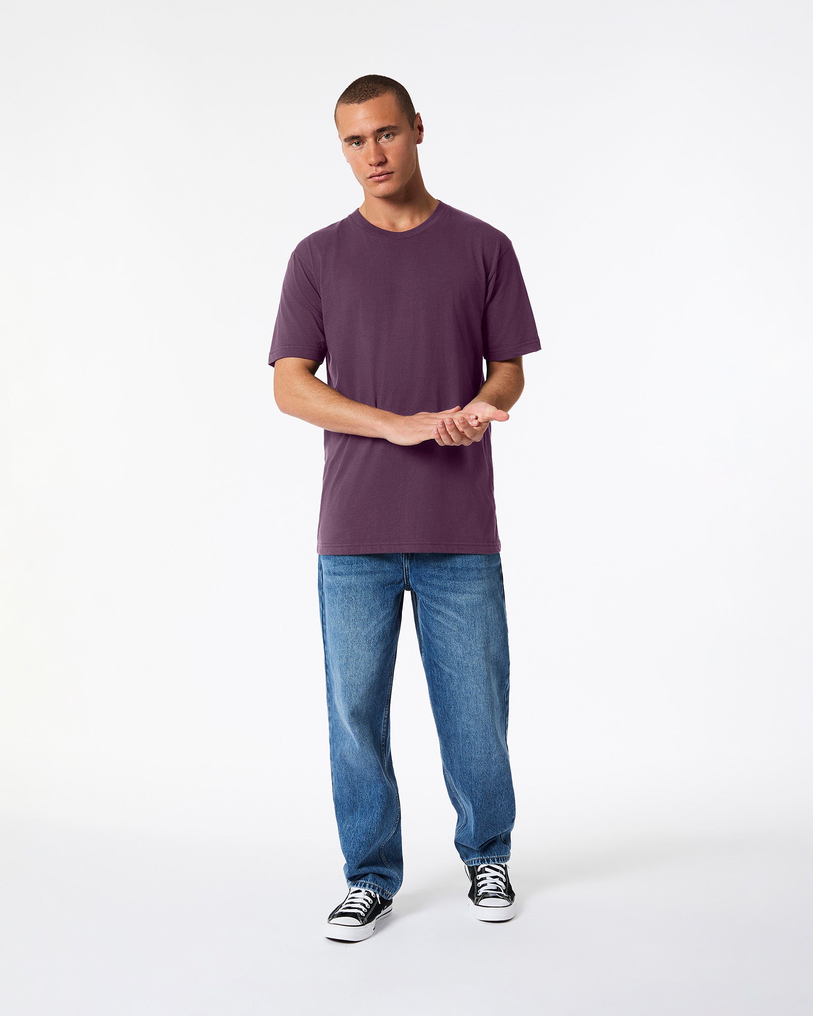 Male mode wearing eggplant colour American Apparel Fine jersey Unisex Short Sleeve Crew Neck Tee (Front pose) -eggplant