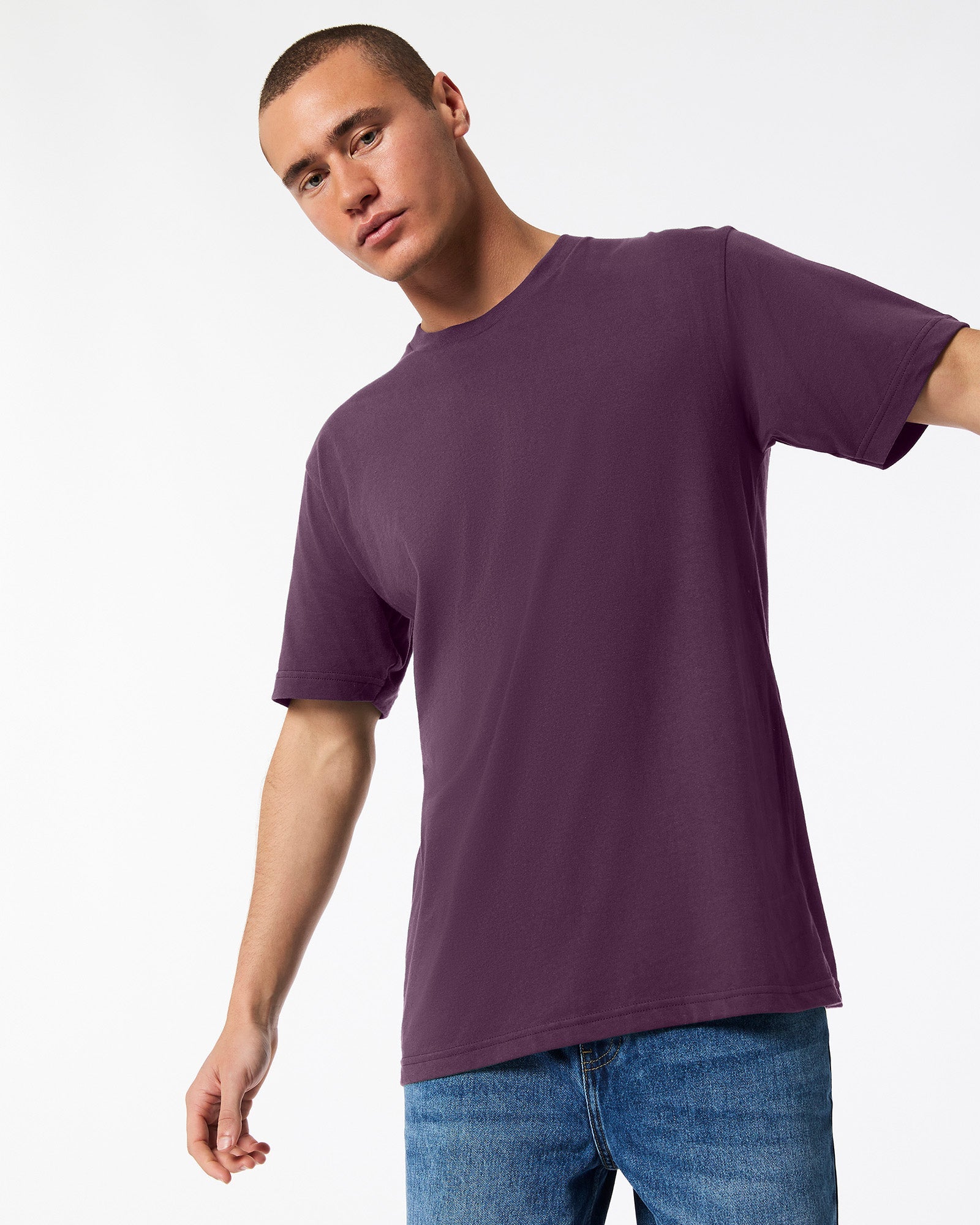 Male mode wearing eggplant colour American Apparel Fine jersey Unisex Short Sleeve Crew Neck Tee (Front pose) -eggplant