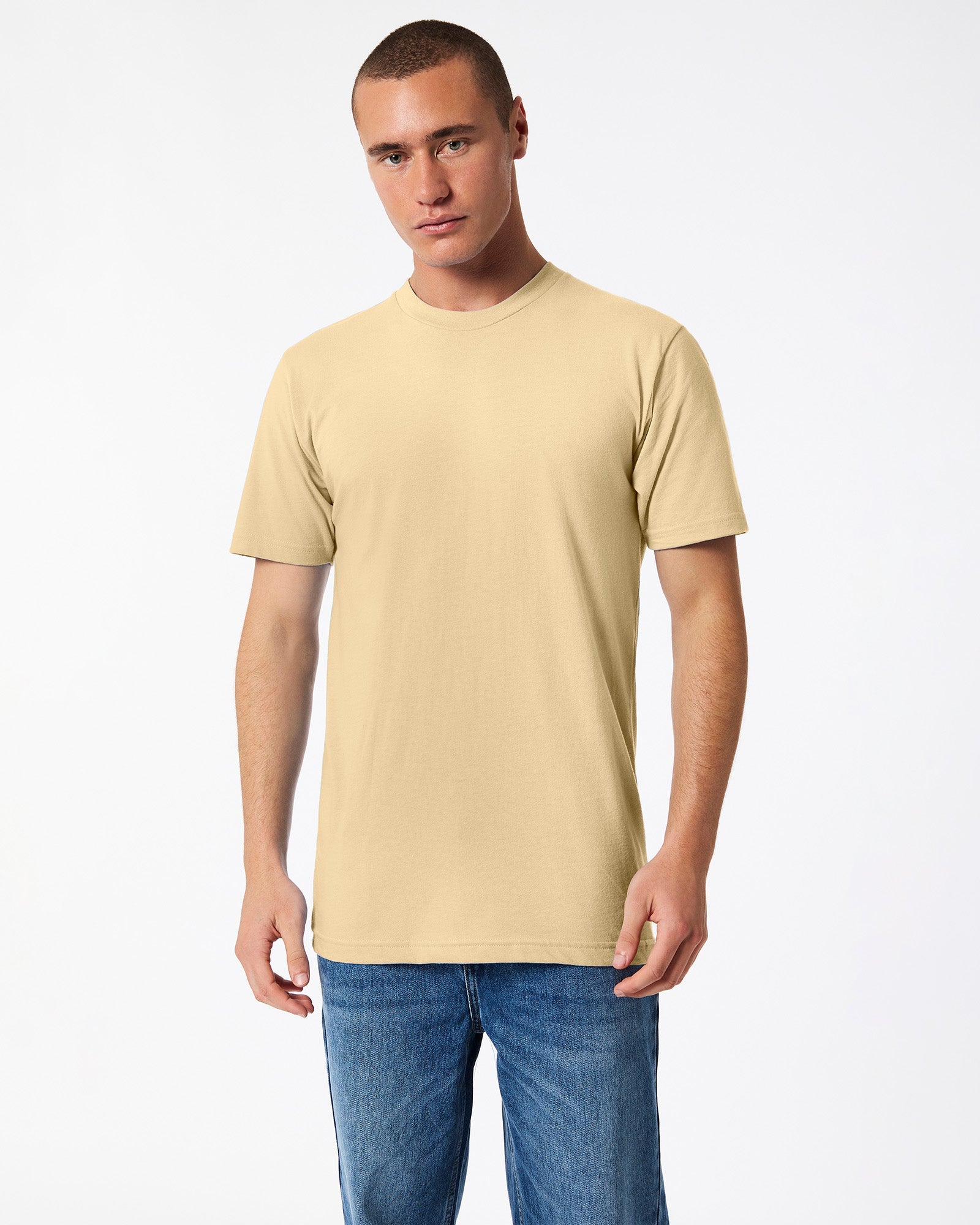 Male mode wearing cream colour American Apparel Fine jersey Unisex Short Sleeve Crew Neck Tee (Front pose) -cream