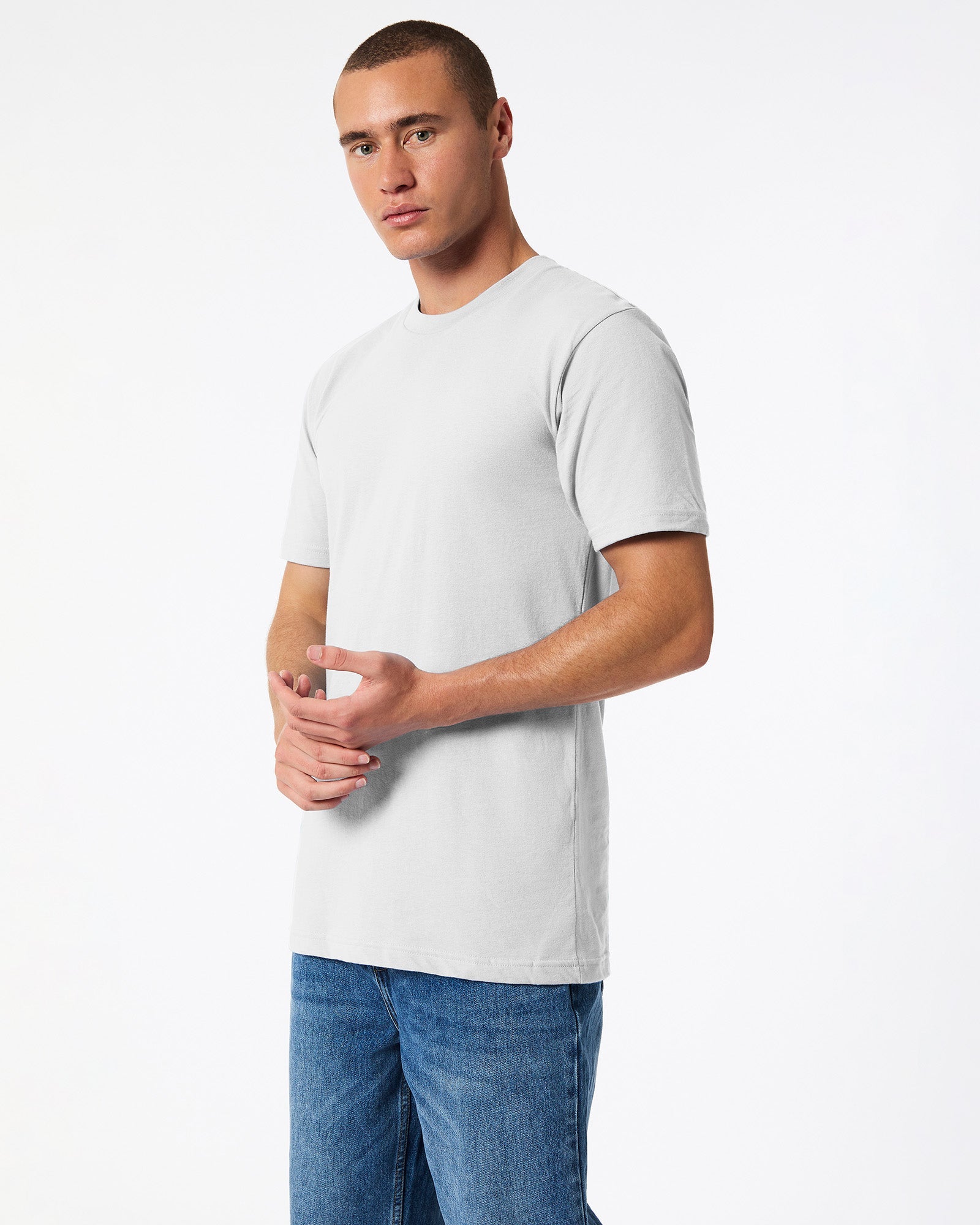 male model wearing new silver colour Fine Jersey Unisex Crew Neck Tee (side pose) -new silver