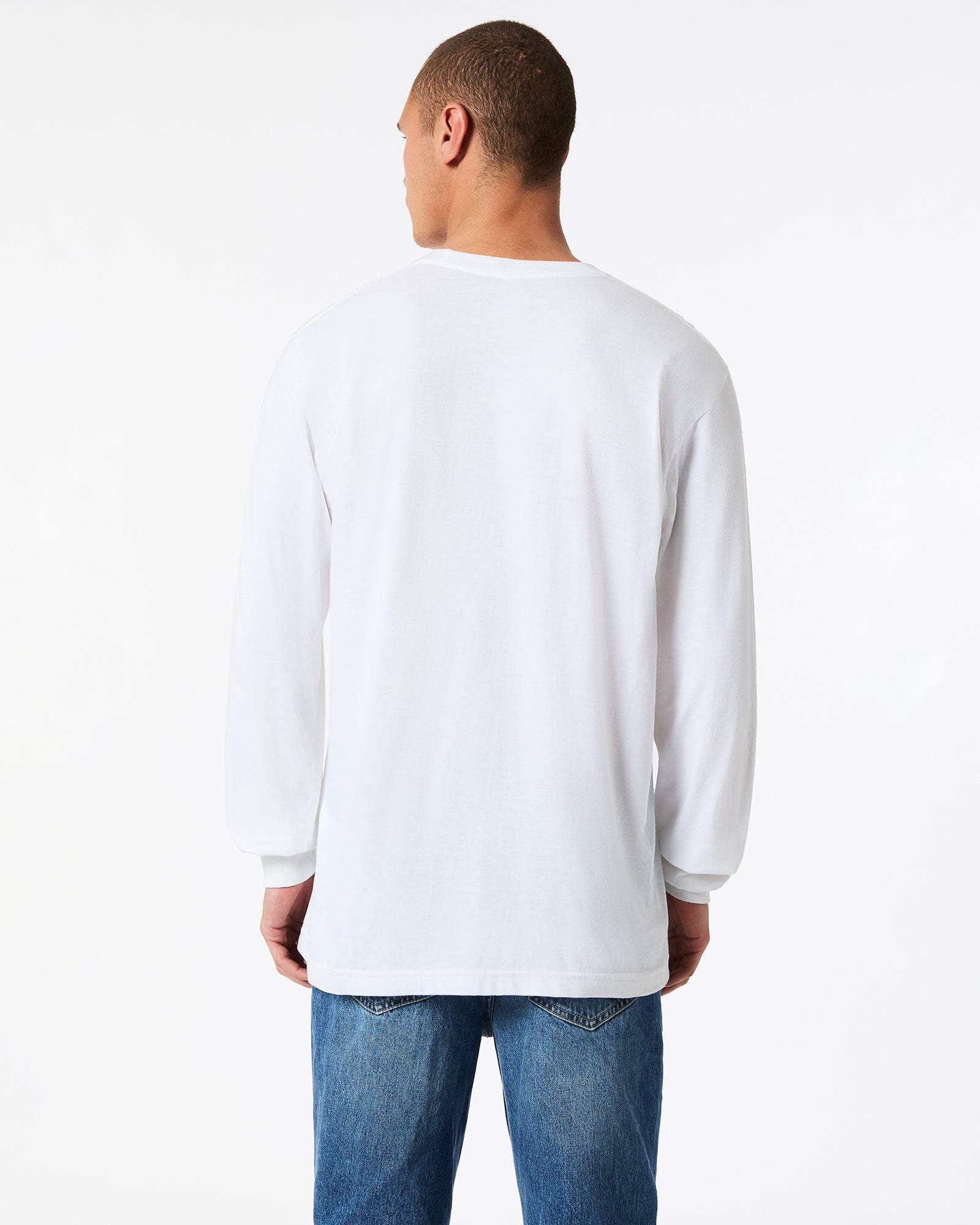 male model wearing American Apparel white Colour Fine Jersey Unisex Long Sleeve Crew Neck Tee (back pose) -white