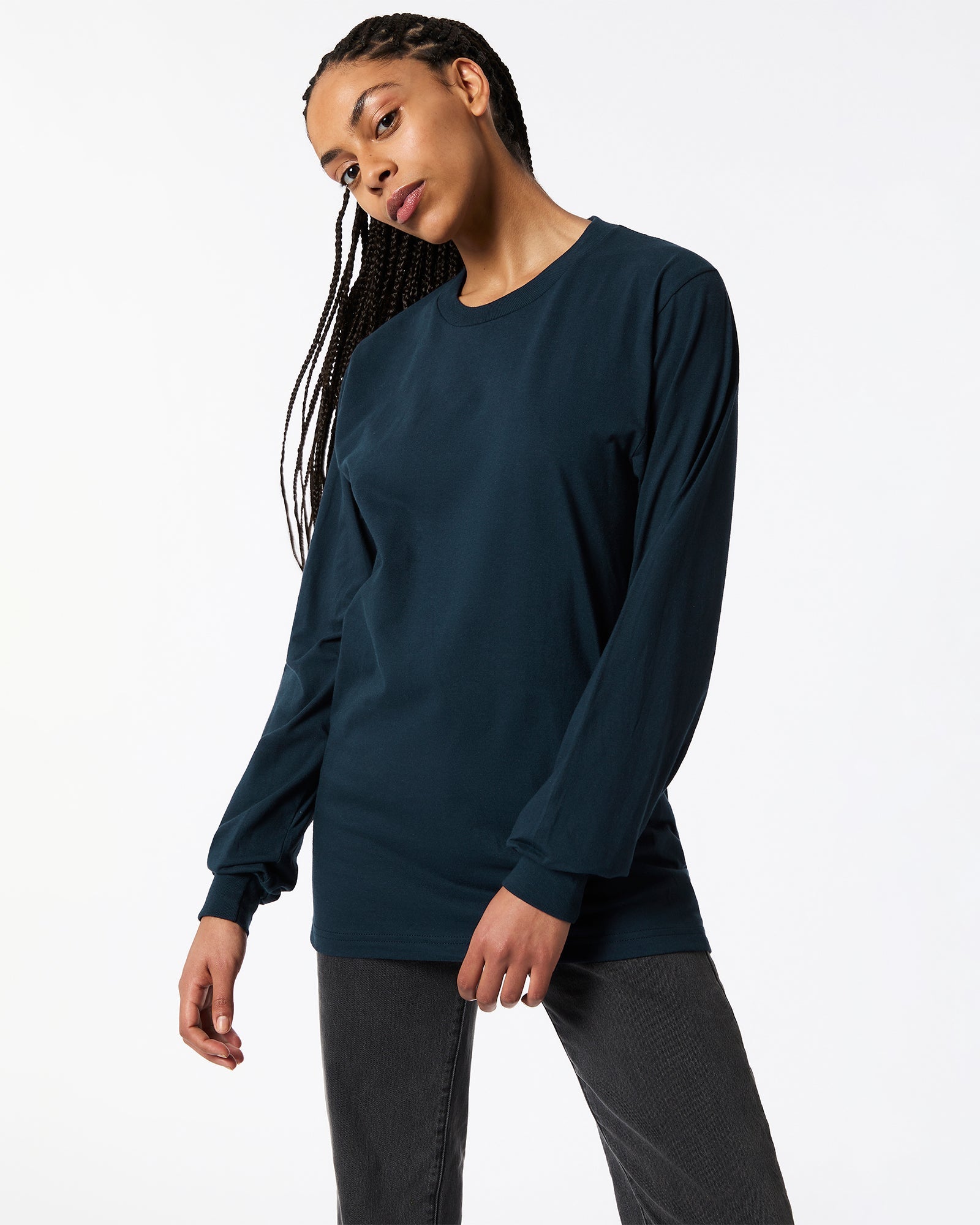 Female model wearing American Apparel Navy Colour Fine Jersey Unisex Long Sleeve Crew Neck Tee (Front pose) -navy