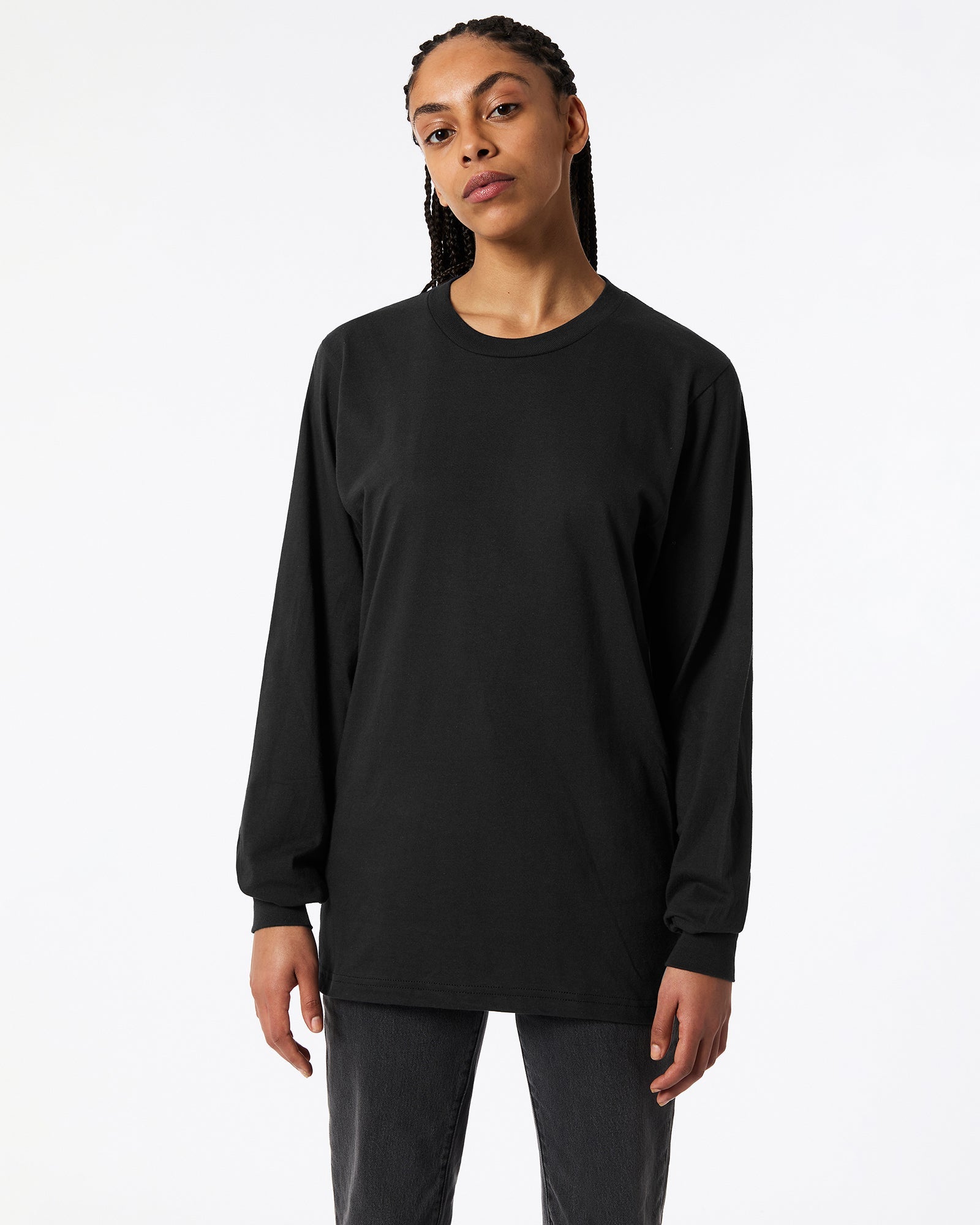 Female model wearing Black Colour Fine Jersey Unisex Long Sleeve Crew Neck Tee (Front pose) -black