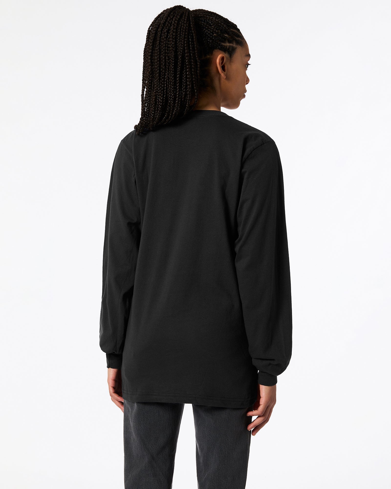 Female model wearing Black Colour Fine Jersey Unisex Long Sleeve Crew Neck Tee (Back pose) -black