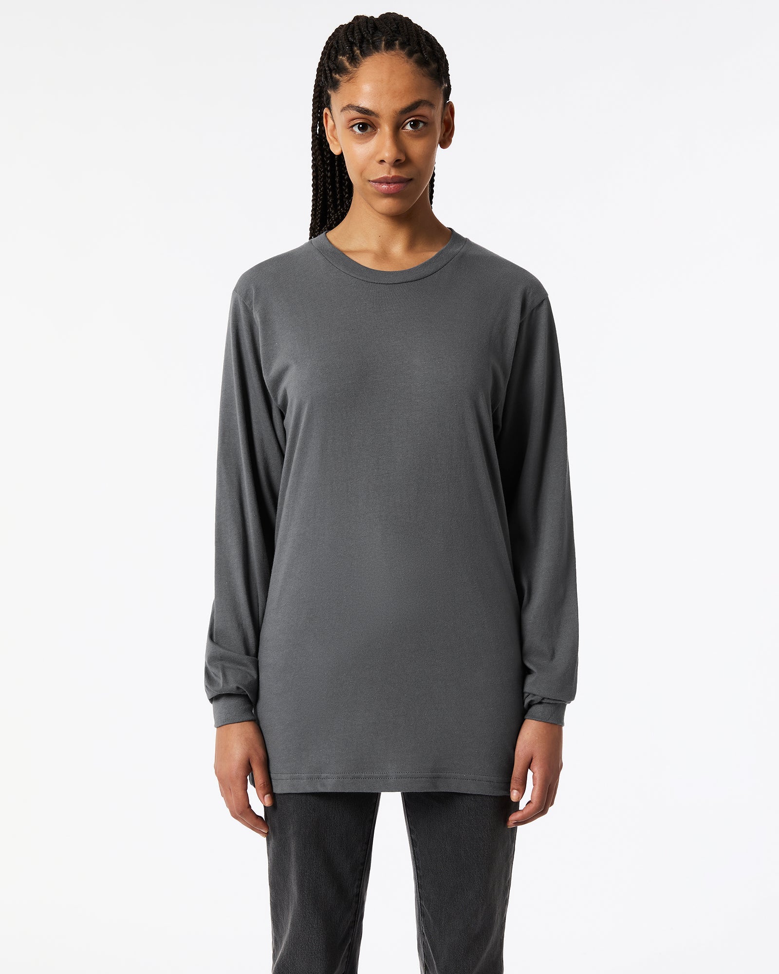 Female model wearing Asphalt Colour Fine Jersey Unisex Long Sleeve Crew Neck Tee (Front pose) -asphalt