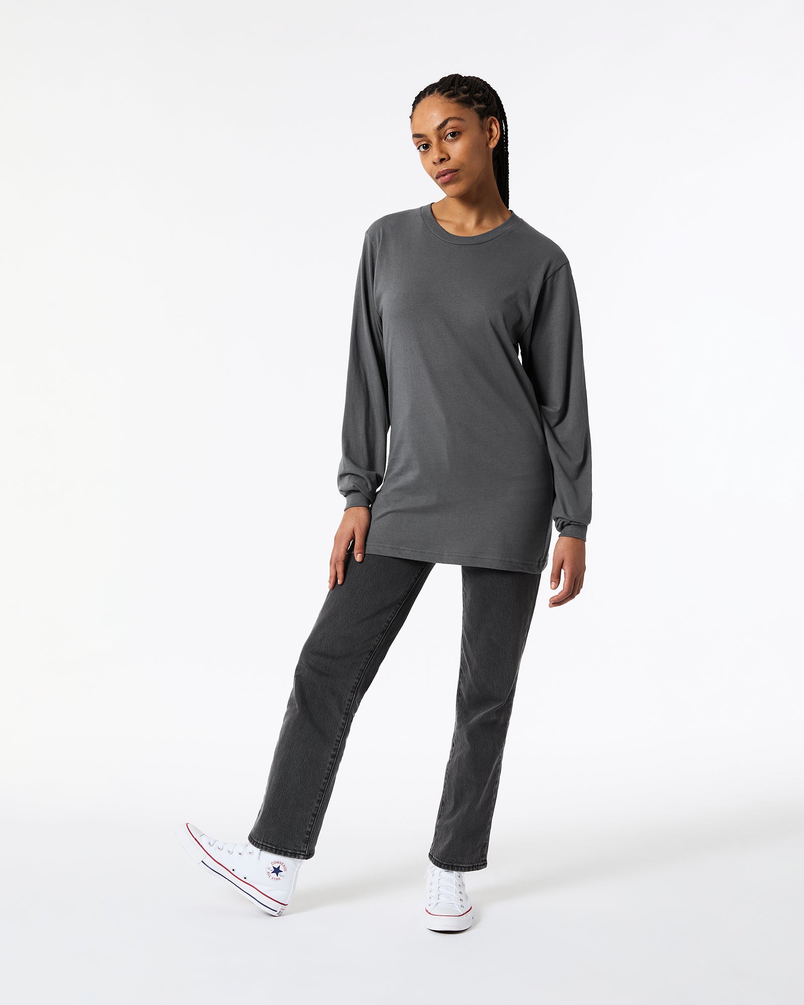 Female model wearing Asphalt Colour Fine Jersey Unisex Long Sleeve Crew Neck Tee (Front pose) -asphalt