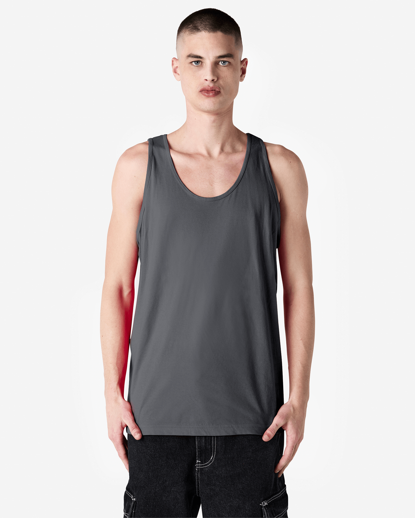 Male model wearing asphalt colour American Apparel Fine Jersey Unisex Tank Top (front pose) -asphalt