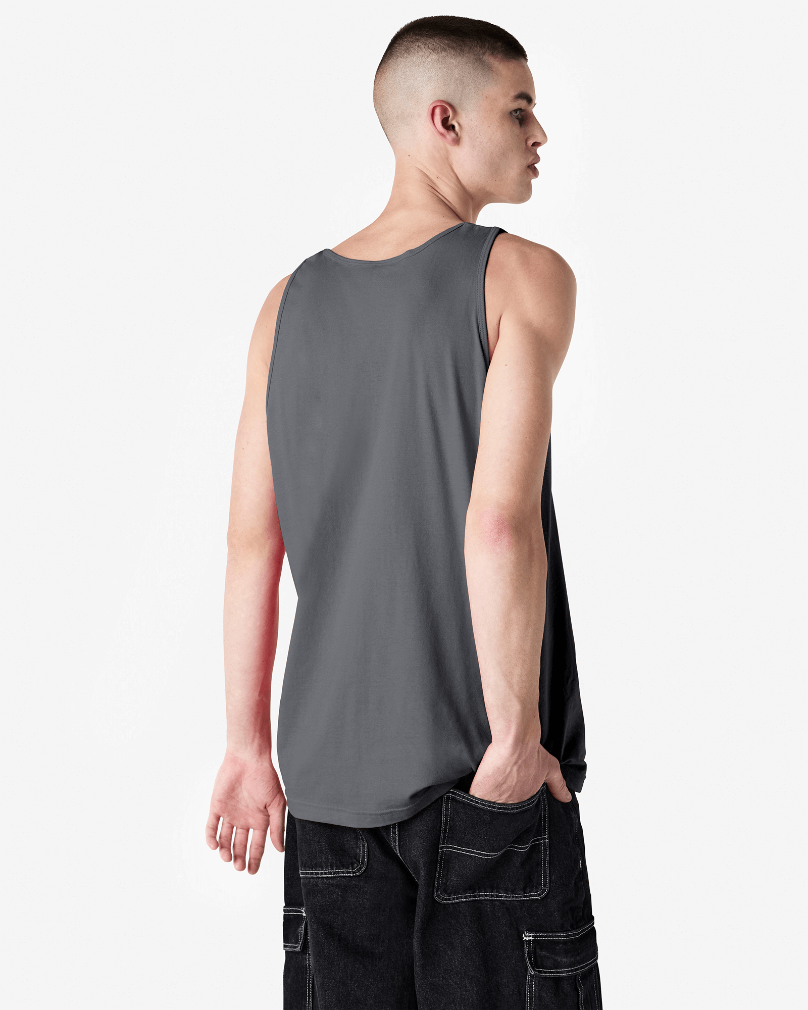 Male model wearing asphalt colour American Apparel Fine Jersey Unisex Tank Top (back pose) -asphalt