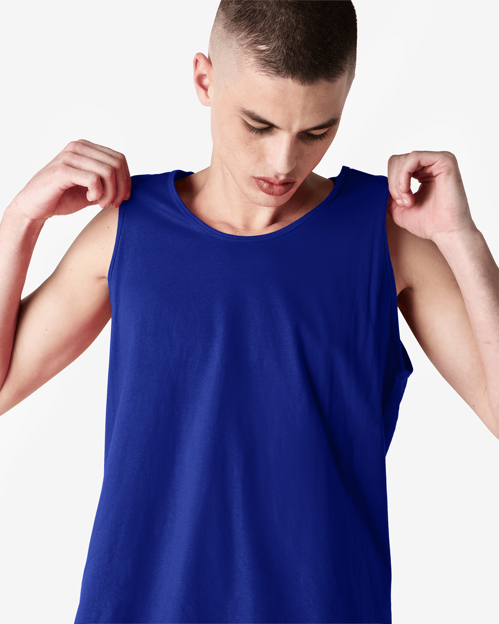 Male model wearing lapis colour American Apparel Fine Jersey Unisex Tank Top (front pose) -lapis