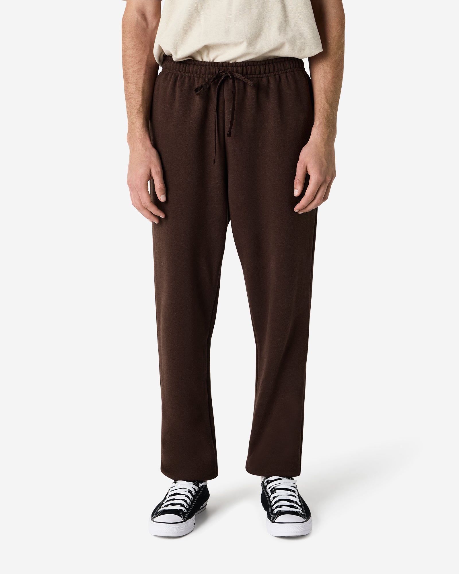 Male model wearing American Apparel Bone Sweatpants (front pose) -brown
