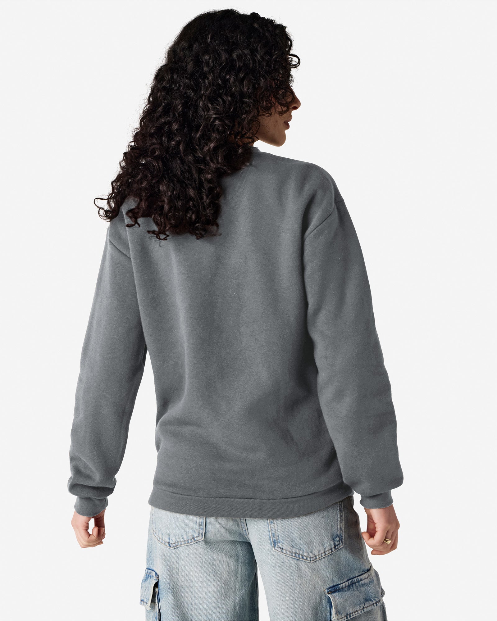 Female model wearing a Reflex Unisex Crewneck Sweatshirt (back pose) -asphalt