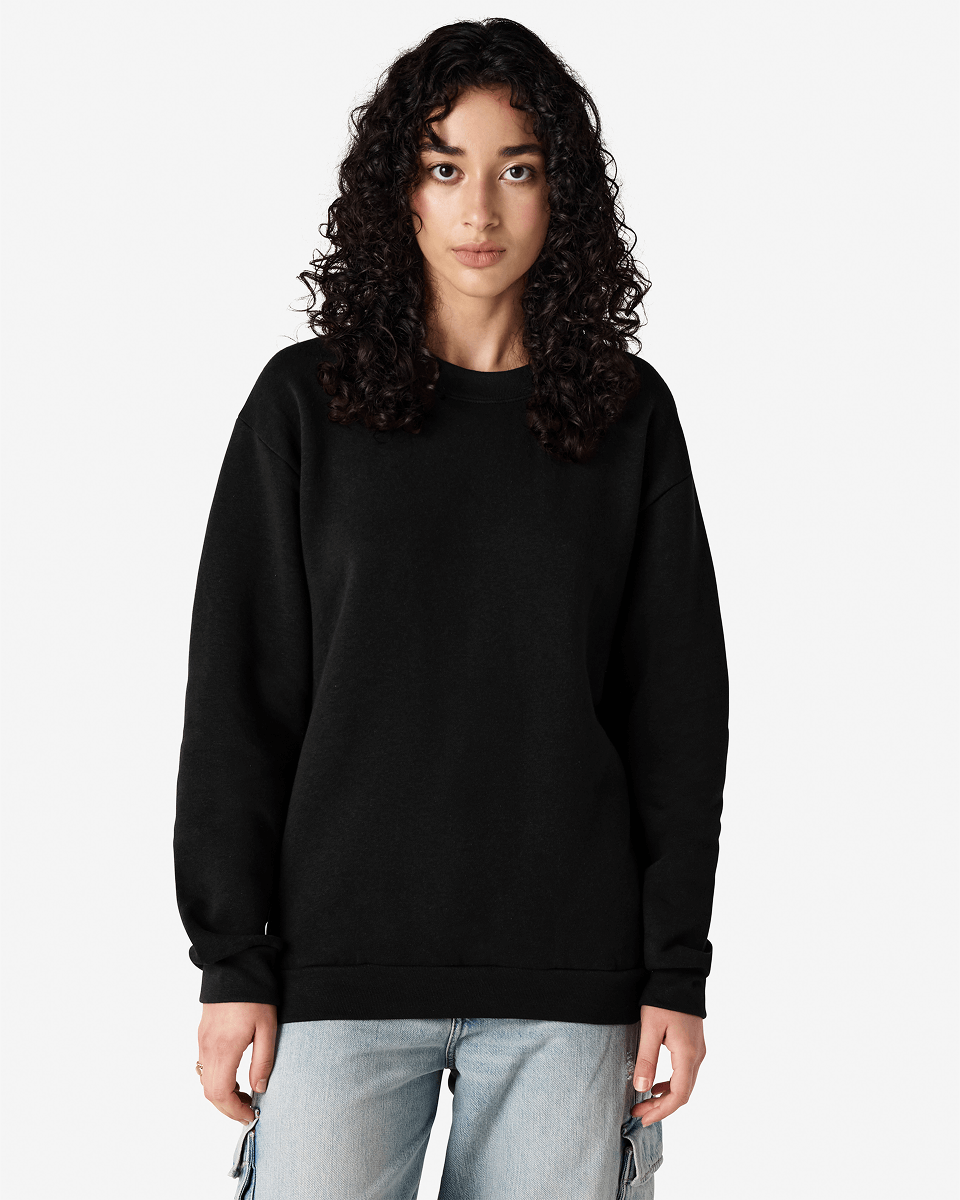 Female model wearing a Reflex Unisex Crewneck Sweatshirt (front pose) -black