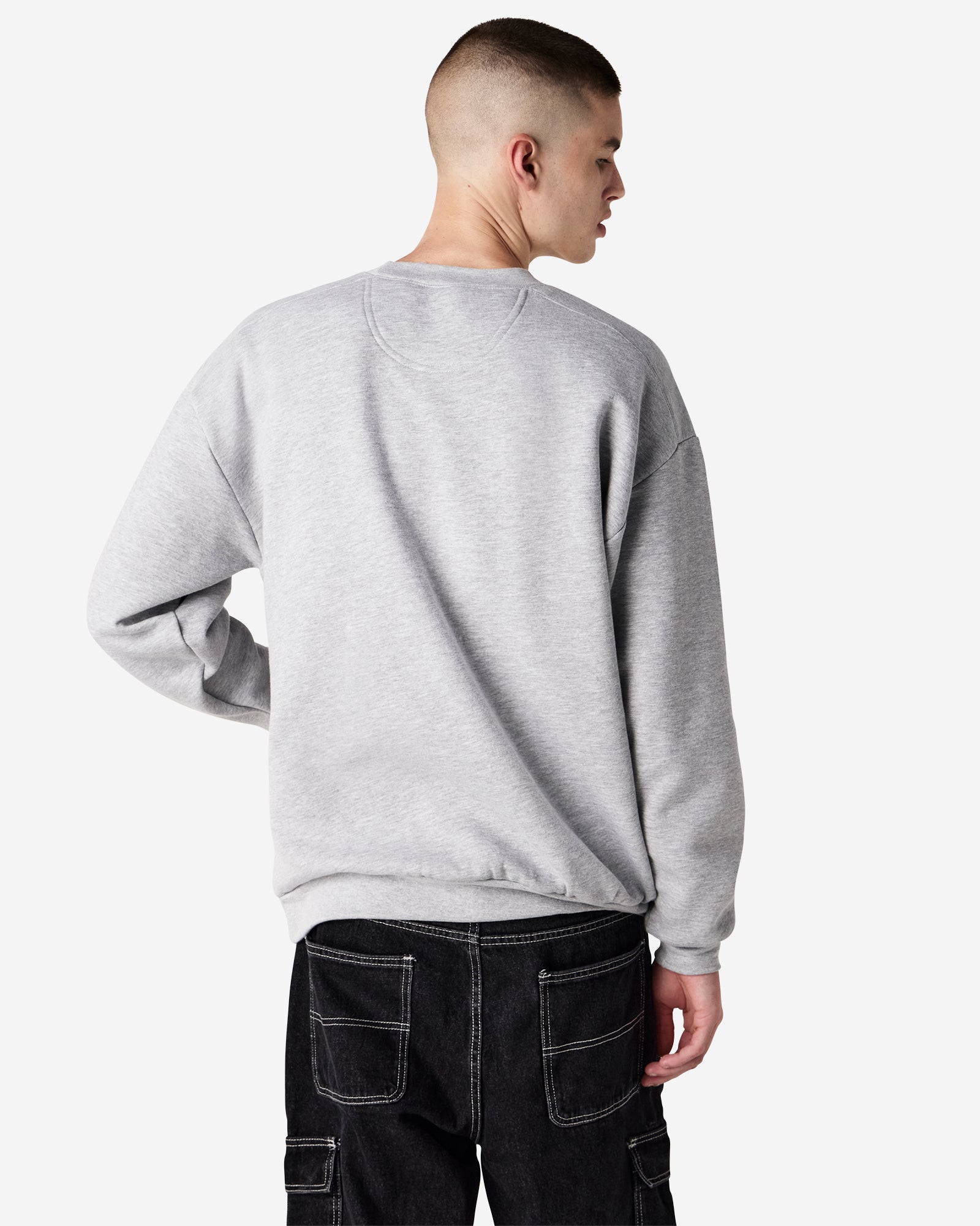 Male model wearing a Reflex Unisex Crewneck Sweatshirt (back pose) -heather grey