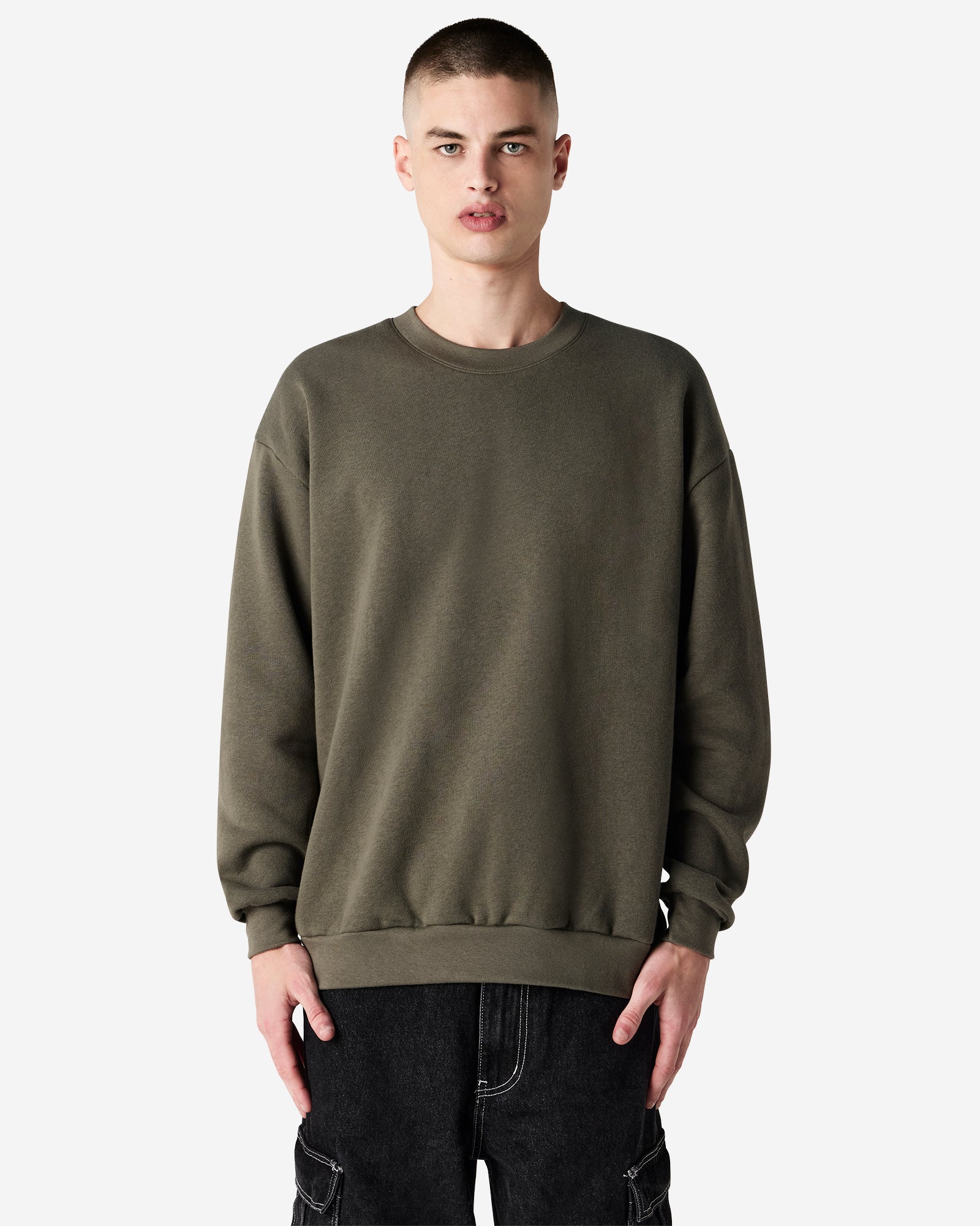 Male model wearing a Reflex Unisex Crewneck Sweatshirt (front pose) -lieutenant