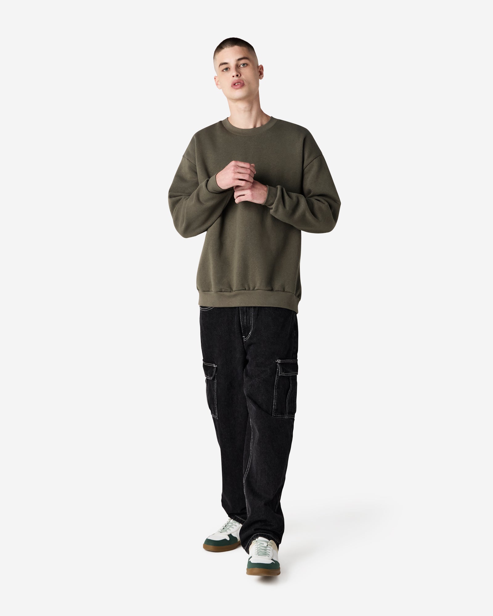 Male model wearing a Reflex Unisex Crewneck Sweatshirt (front pose) -lieutenant