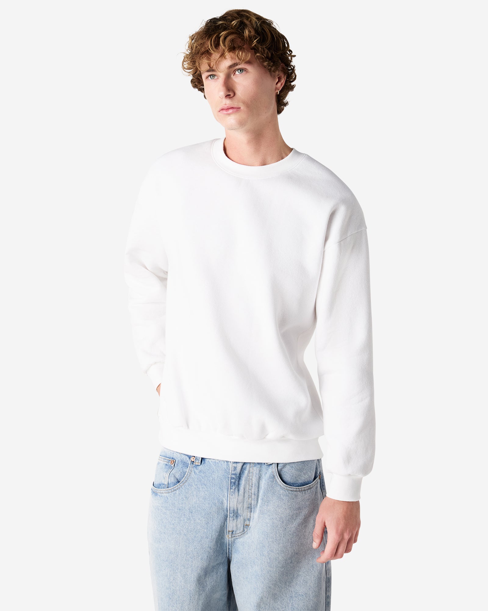 Male model wearing a Reflex Unisex Crewneck Sweatshirt (front pose) -white