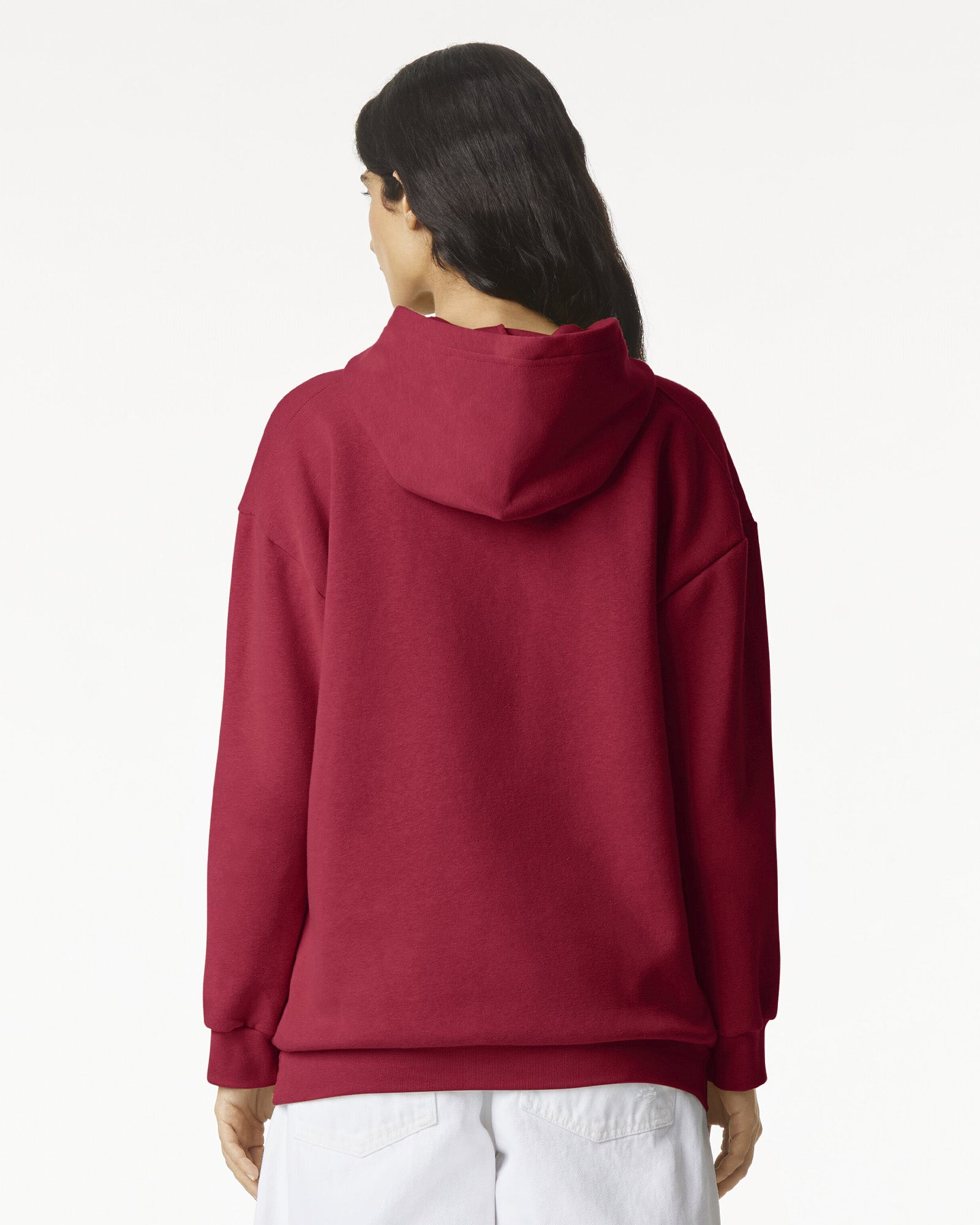Female model wearing a Reflex Unisex Hooded Sweatshirt (back pose) -cardinal red