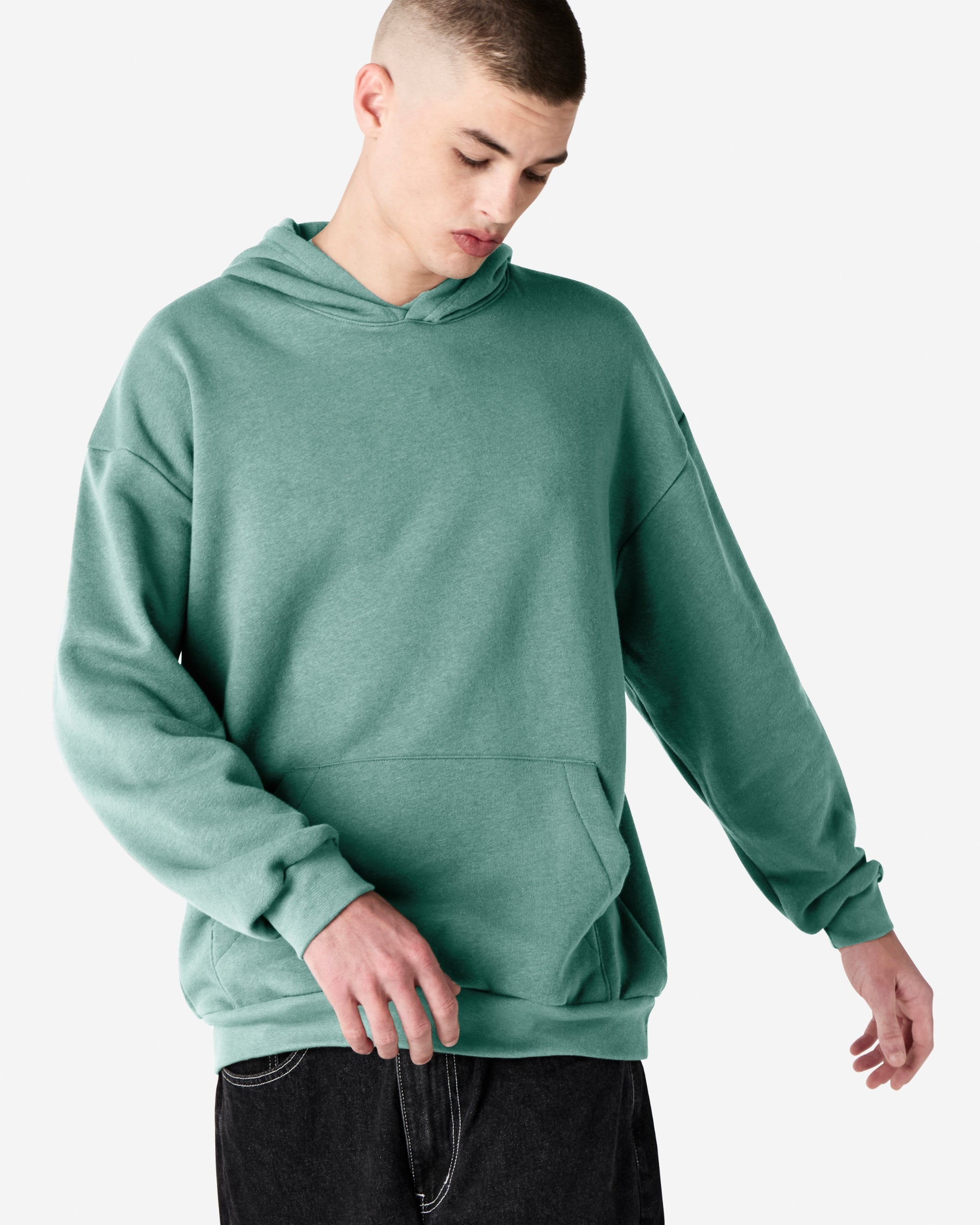Male model wearing a Reflex Unisex Hooded Sweatshirt (front pose) -arctic