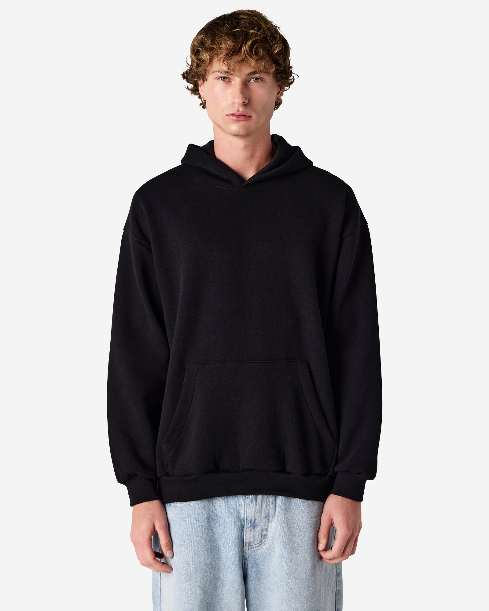 Male model wearing a Reflex Unisex Hooded Sweatshirt (front pose) -black