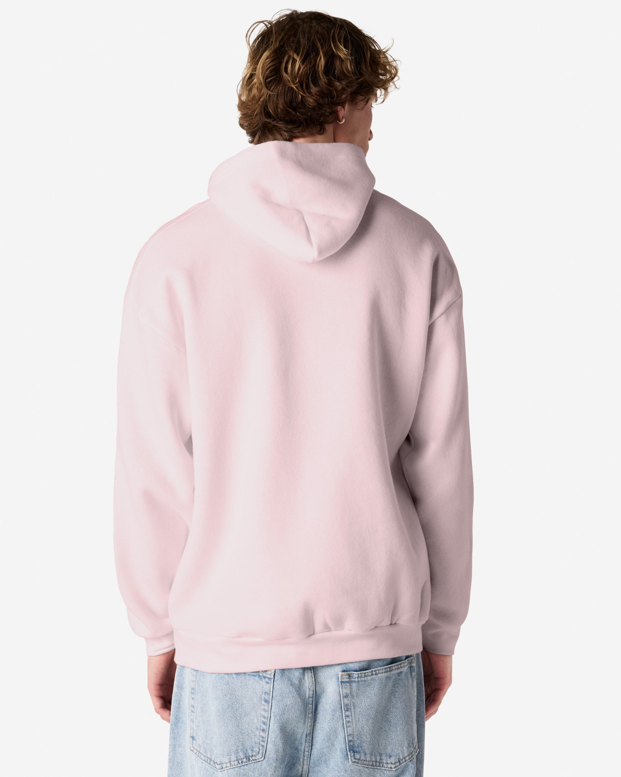 Male model wearing a Reflex Unisex Hooded Sweatshirt (front pose) -blush