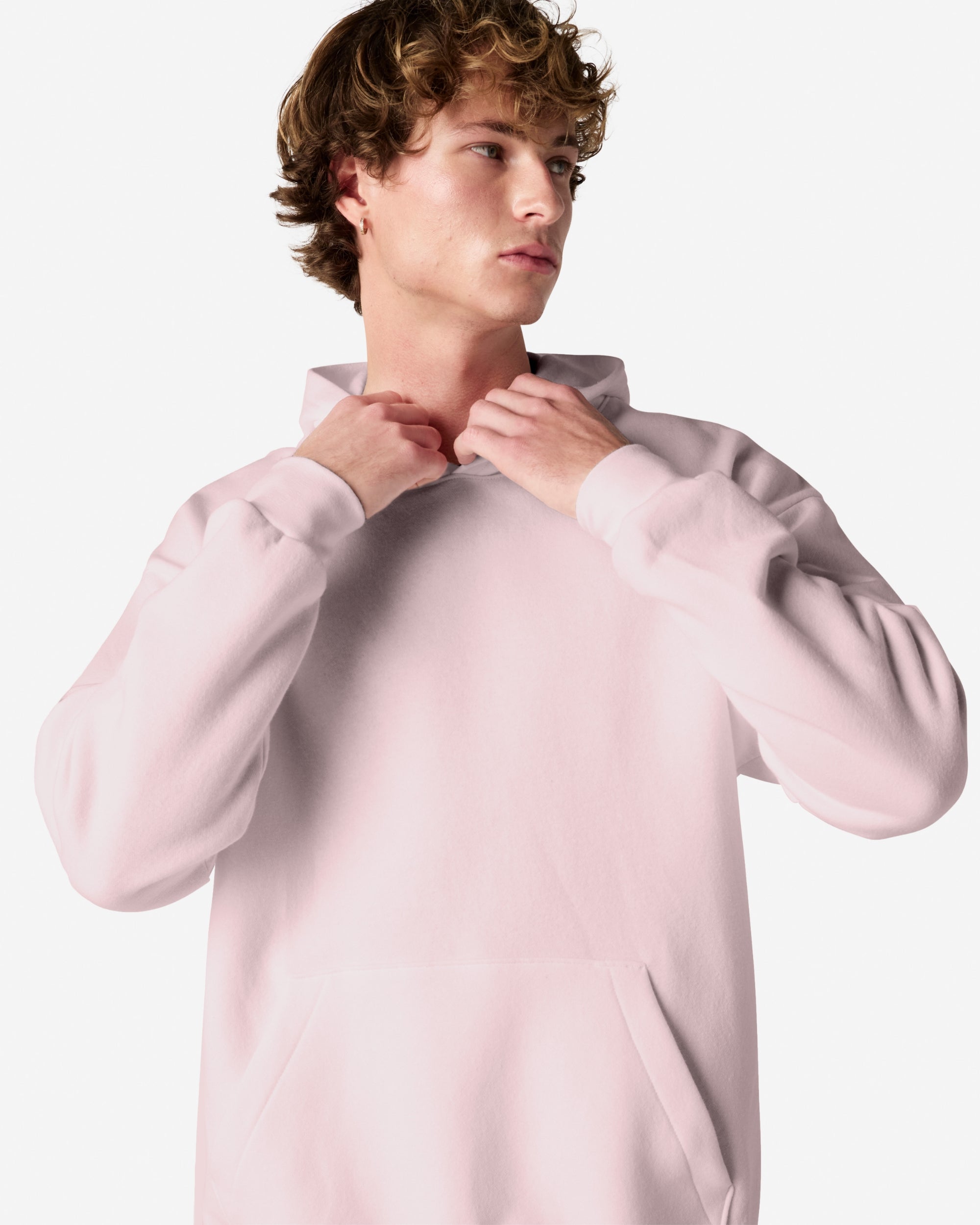 Male model wearing a Reflex Unisex Hooded Sweatshirt (front pose) -blush