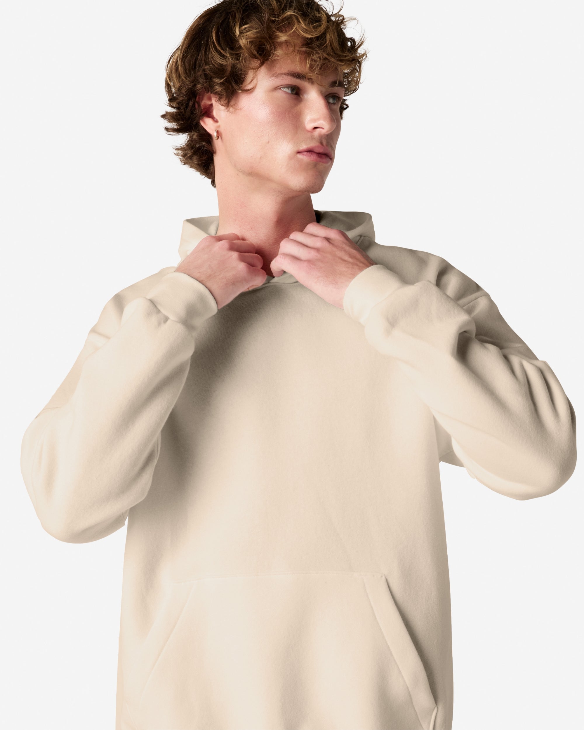 Male model wearing a Reflex Unisex Hooded Sweatshirt (front pose) -bone