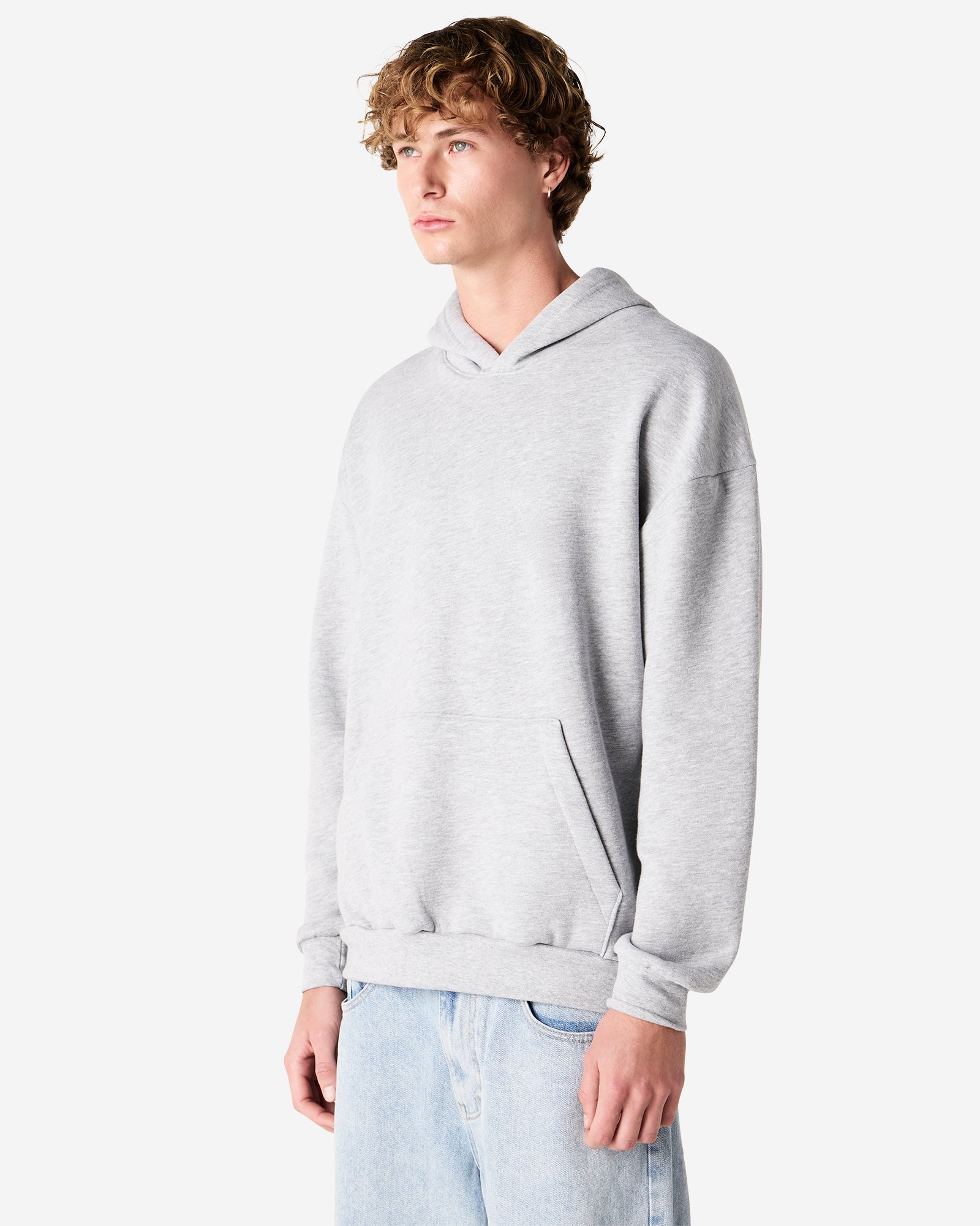 Male model wearing a Reflex Unisex Hooded Sweatshirt (front pose) -heather grey