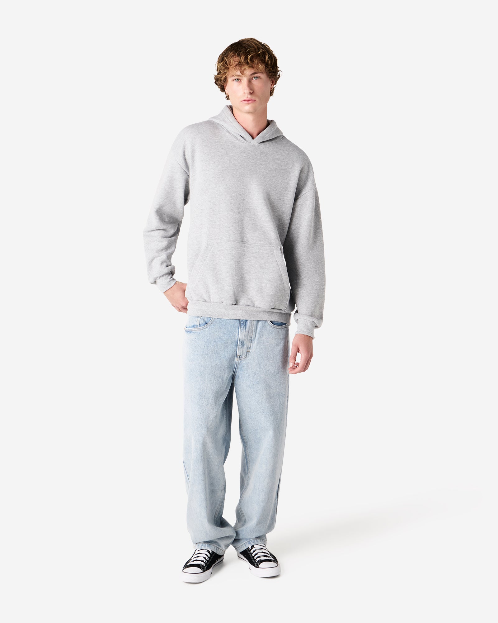Male model wearing a Reflex Unisex Hooded Sweatshirt (front pose) -heather grey