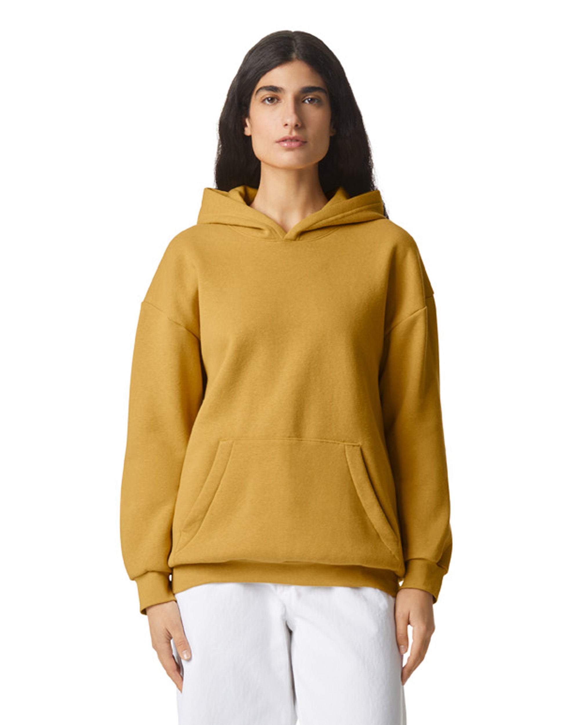 Female model wearing a Reflex Unisex Hooded Sweatshirt (front pose) -mustard