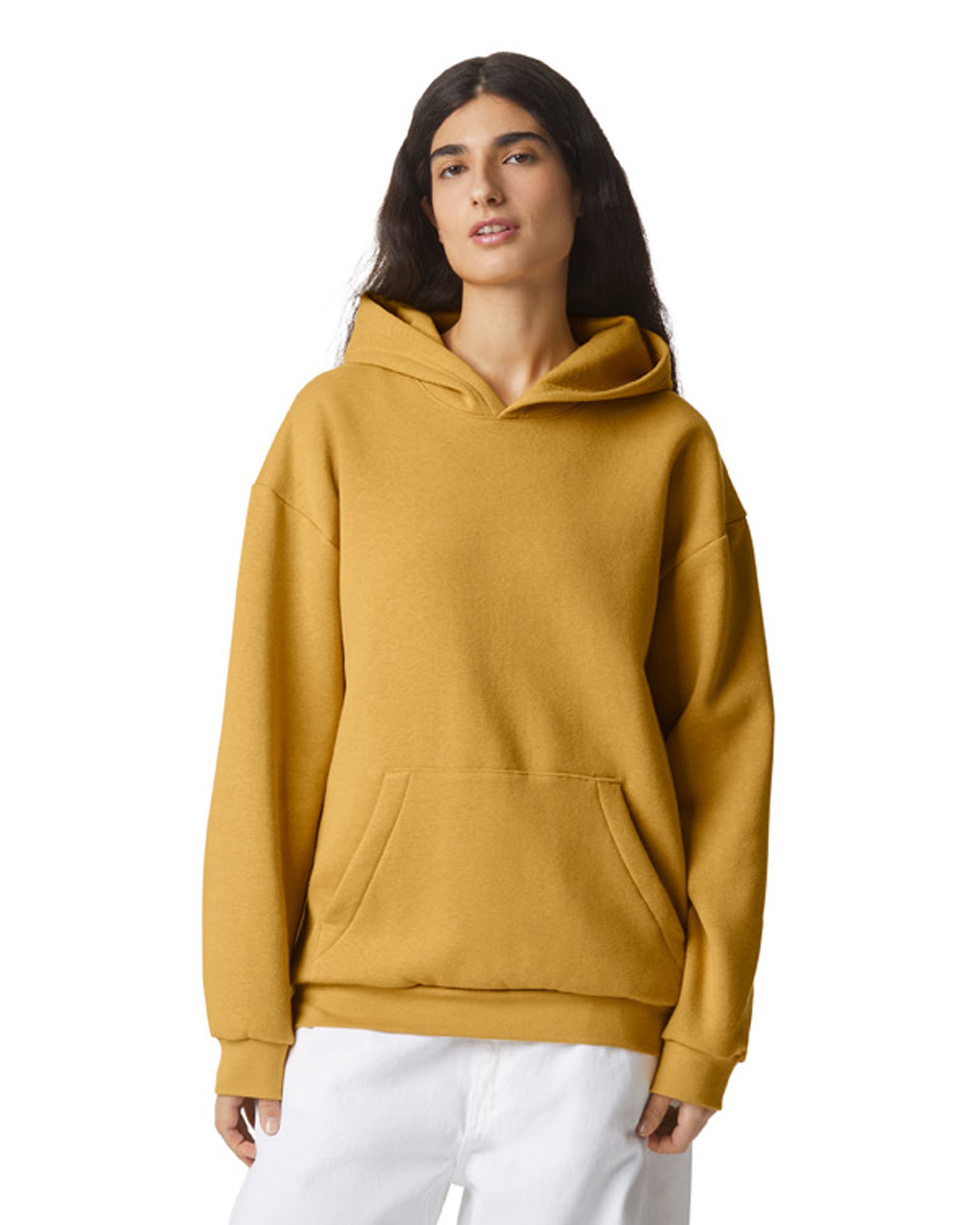 Female model wearing a Reflex Unisex Hooded Sweatshirt (front pose) -mustard