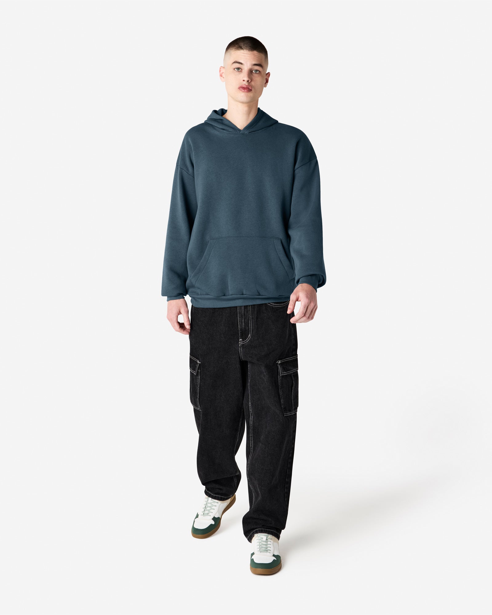 Male model wearing a Reflex Unisex Hooded Sweatshirt (front pose) -sea blue