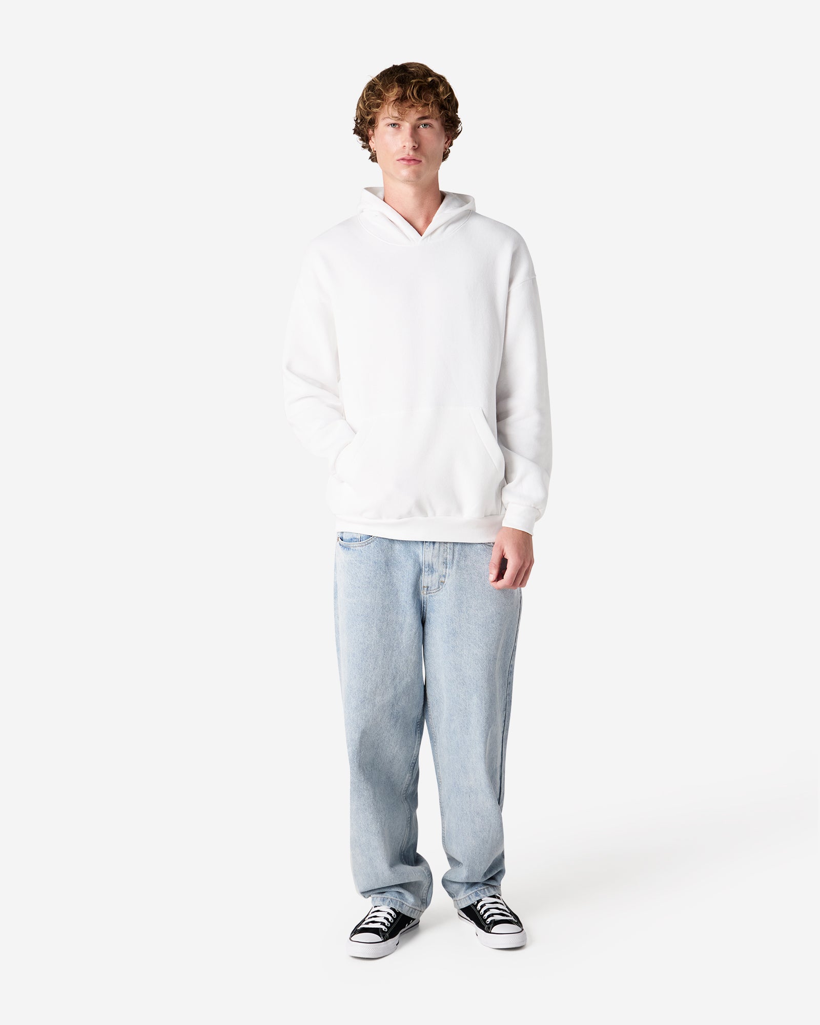 Male model wearing a Reflex Unisex Hooded Sweatshirt (front pose) -white