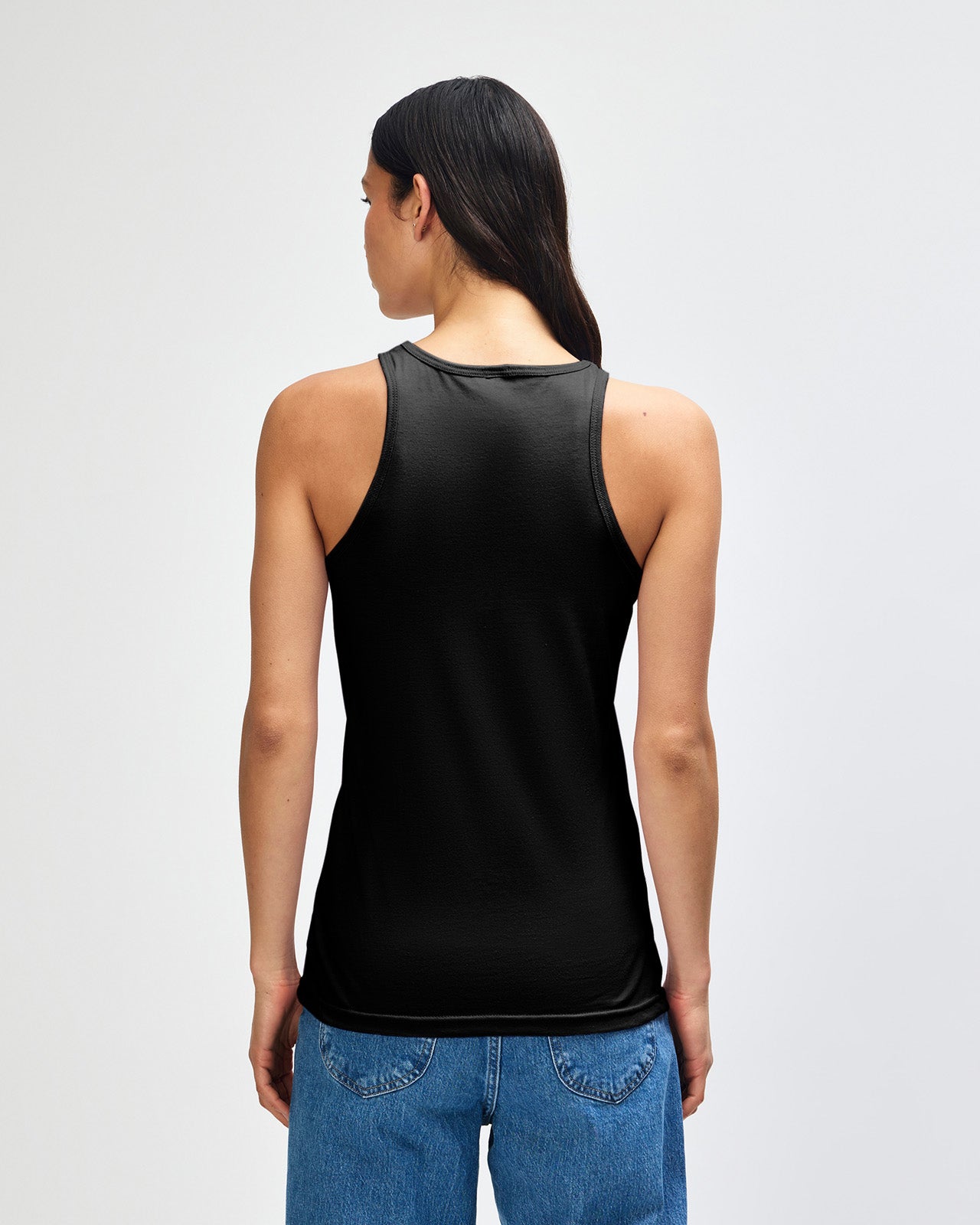 Female model wearing black colour American Apparel Fine Jersey Unisex Tank Top (front pose) -black