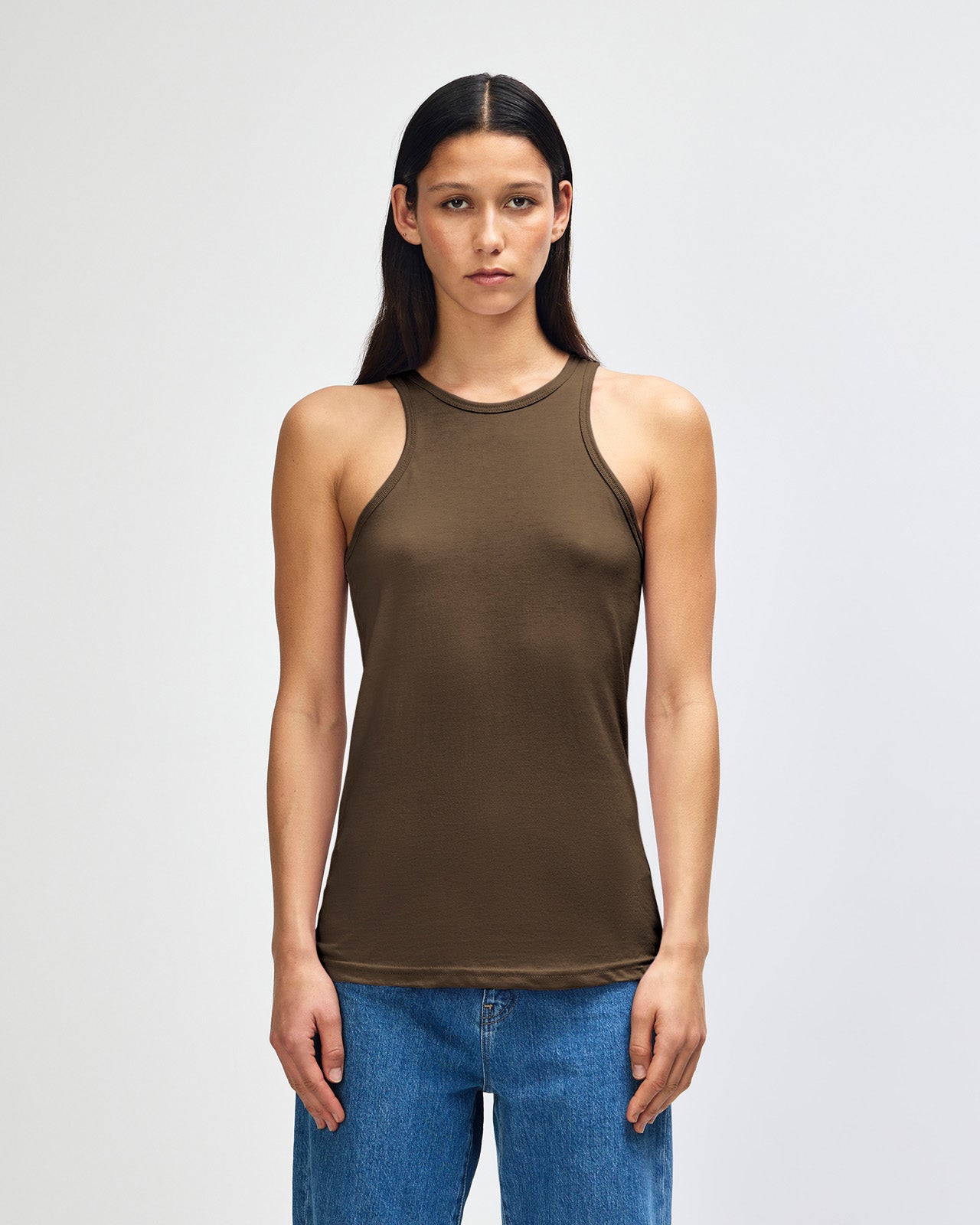 Female model wearing black colour American Apparel Fine Jersey Unisex Tank Top (front pose) -heather army