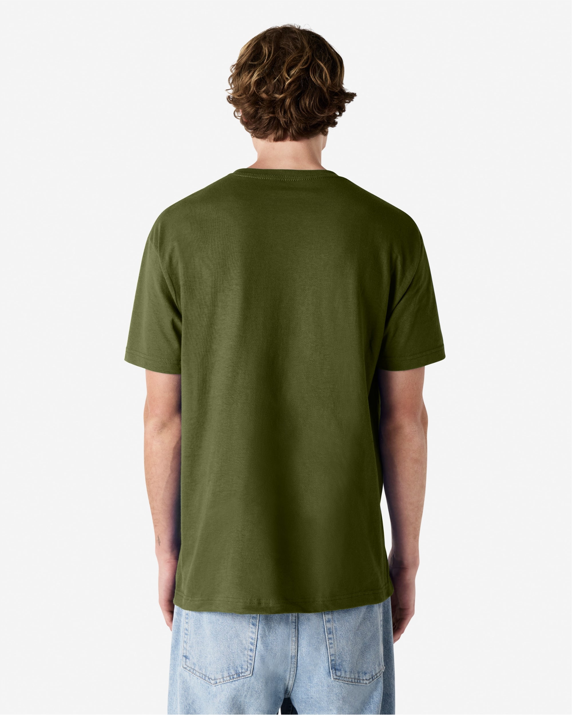 Female Model wearing a Military Green Heavyweight Unisex Short Sleeve Crew Neck Tee, paired with blue jeans, standing against a plain background (back pose) -military green