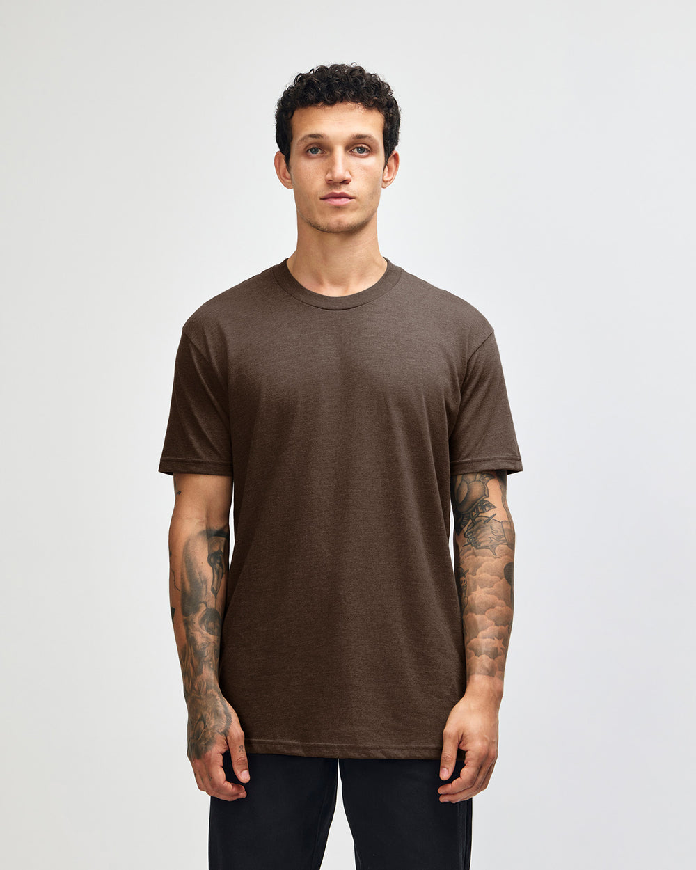 image of Unisex Poly/Cotton : Male model wearing heather brown colour CVC Unisex Short Sleeve Crew Neck Tee (front pose) -heather brown