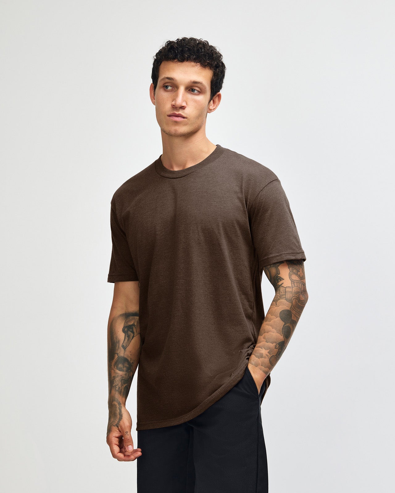Male model wearing heather brown colour CVC Unisex Short Sleeve Crew Neck Tee (front pose) -heather brown