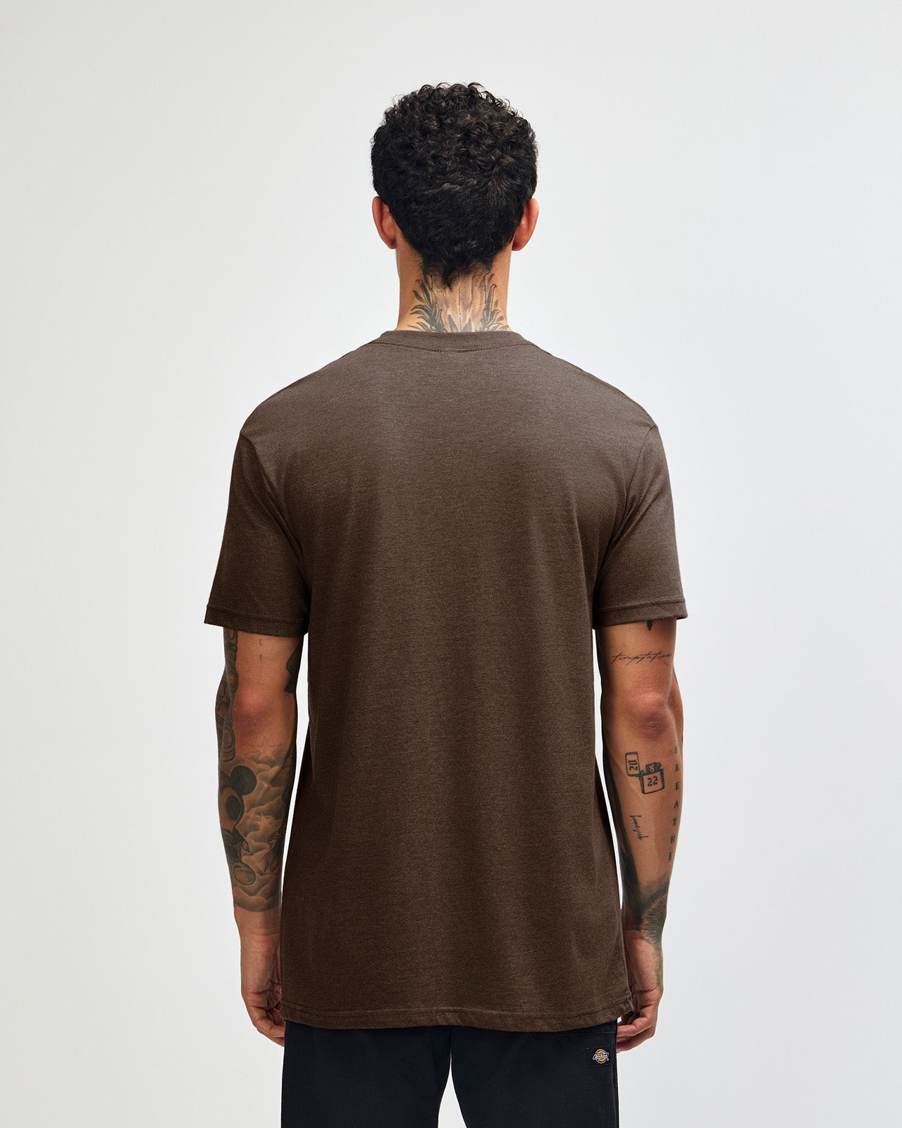 Male model wearing heather brown colour CVC Unisex Short Sleeve Crew Neck Tee (back pose) -heather brown