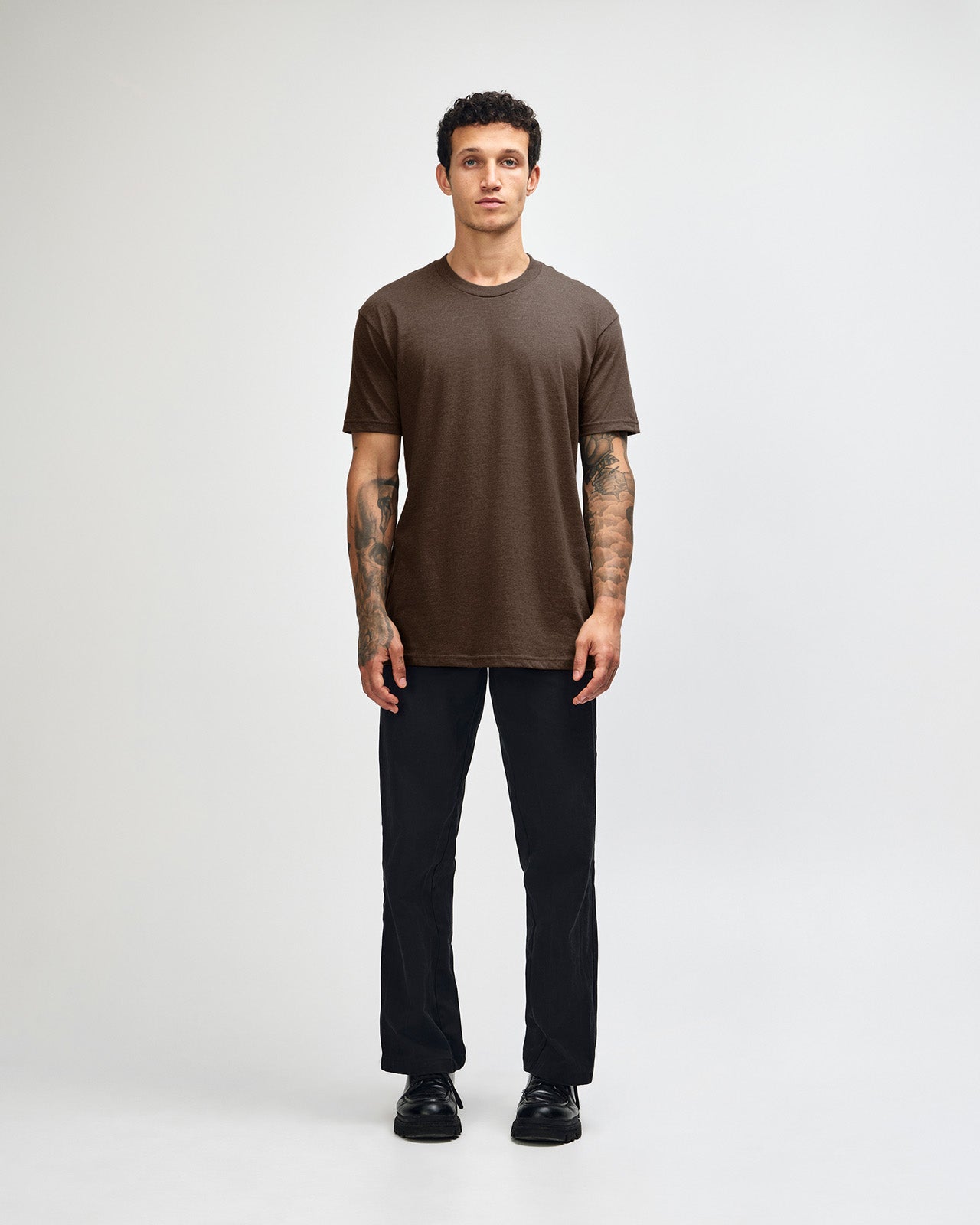 Male model wearing heather brown colour CVC Unisex Short Sleeve Crew Neck Tee (front pose) -heather brown