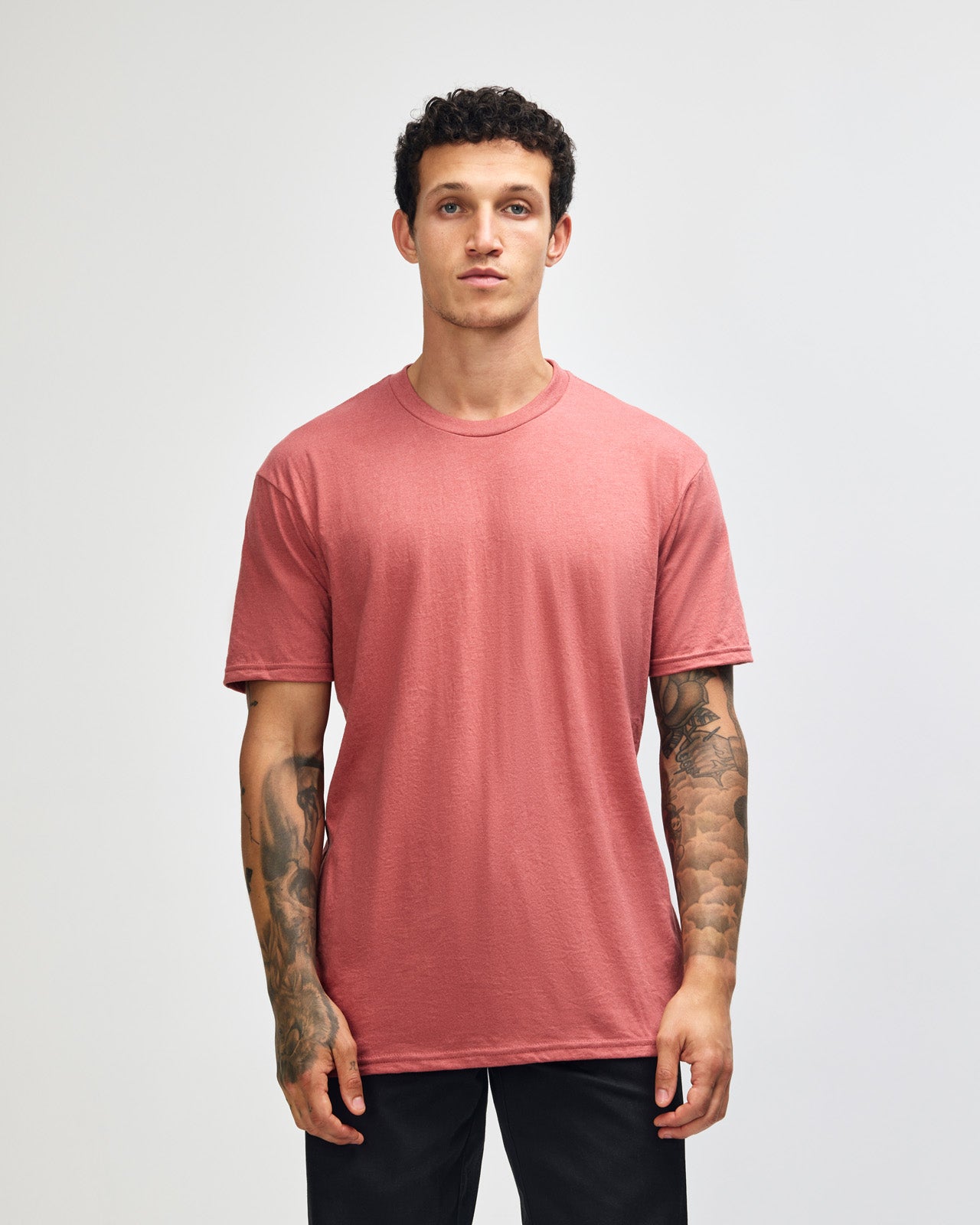 Male model wearing heather canyon colour CVC Unisex Short Sleeve Crew Neck Tee (front pose) -heather canyon