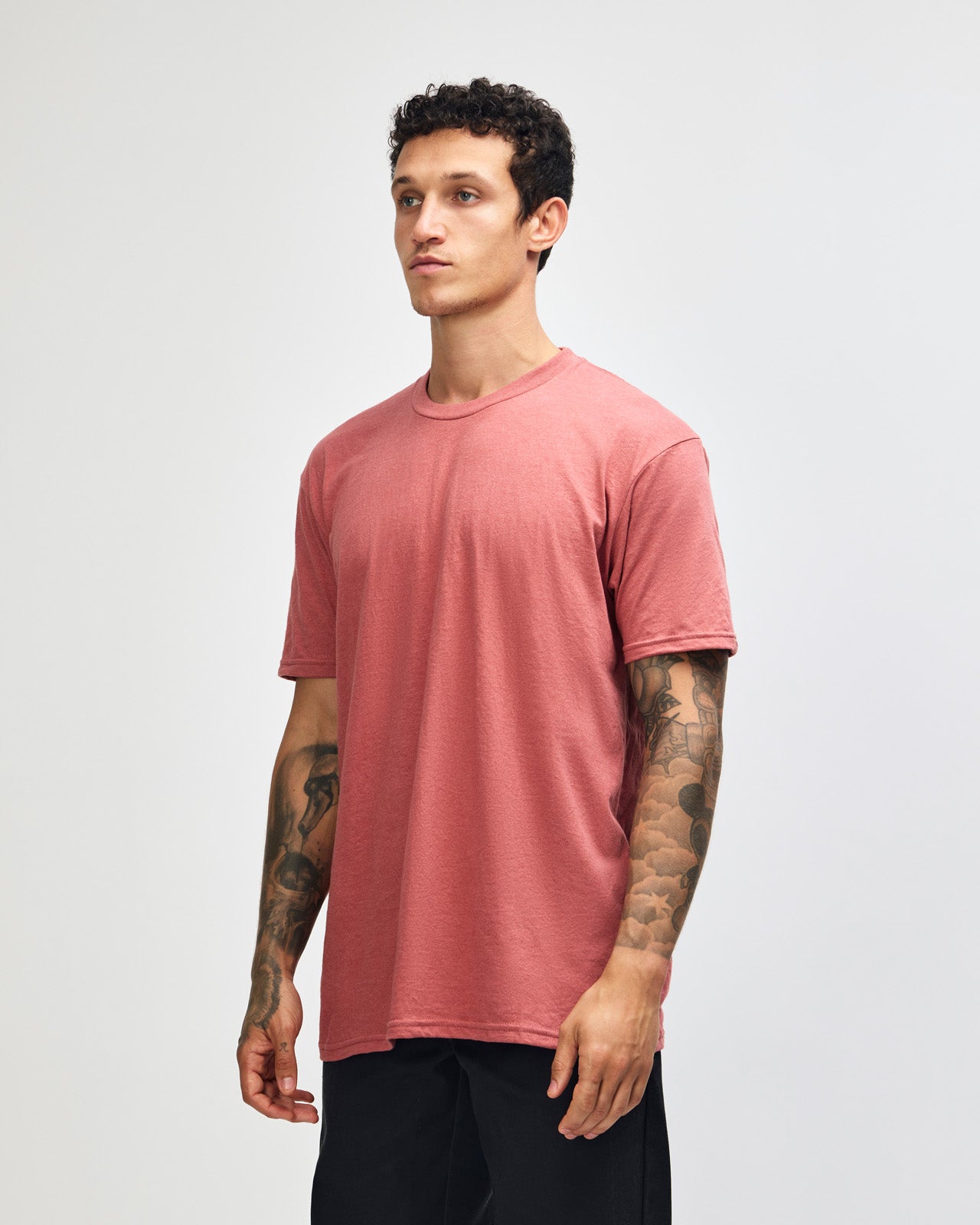 Male model wearing heather canyon colour CVC Unisex Short Sleeve Crew Neck Tee (front pose) -heather canyon